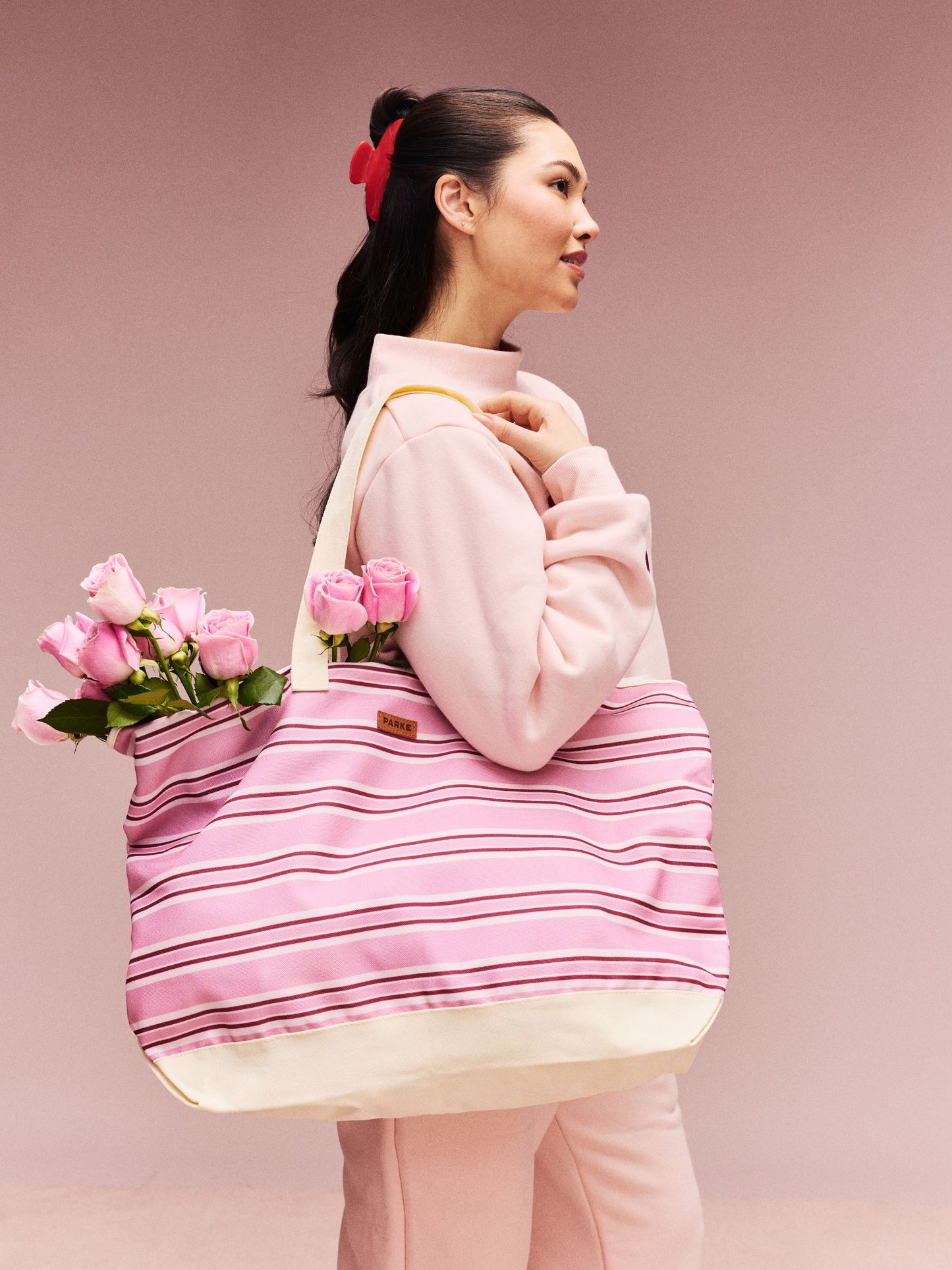 girl wearing Valentine's Day Striped Oversized Tote -sweetheart stripe