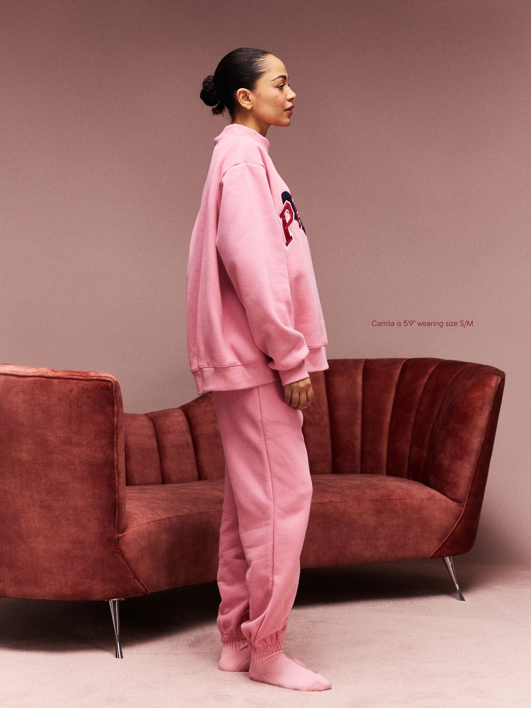 girl wearing Drawstring Unisex Sweatpants -blush