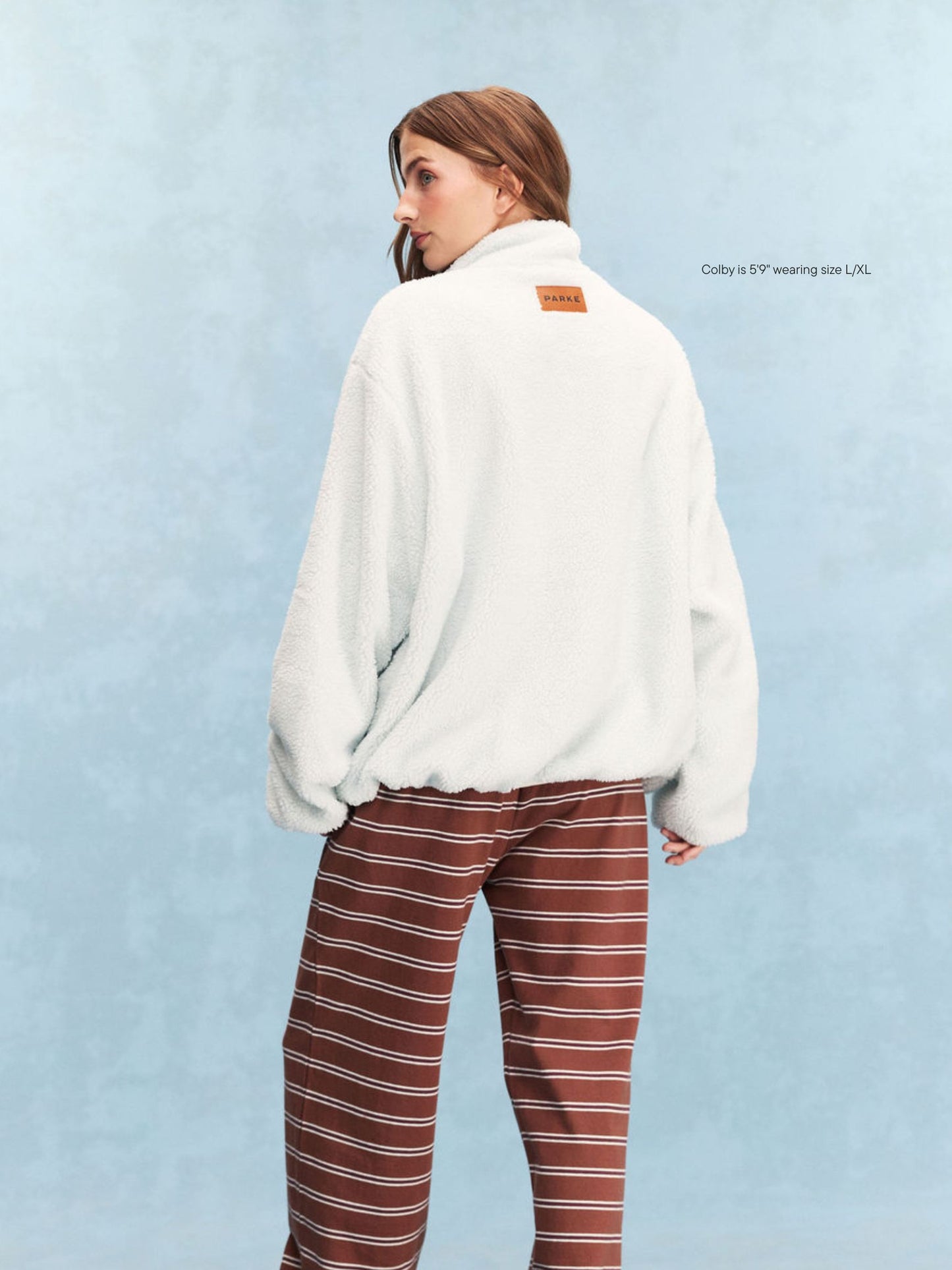 girl wearing Quarter Zip Fleece Pullover -arctic