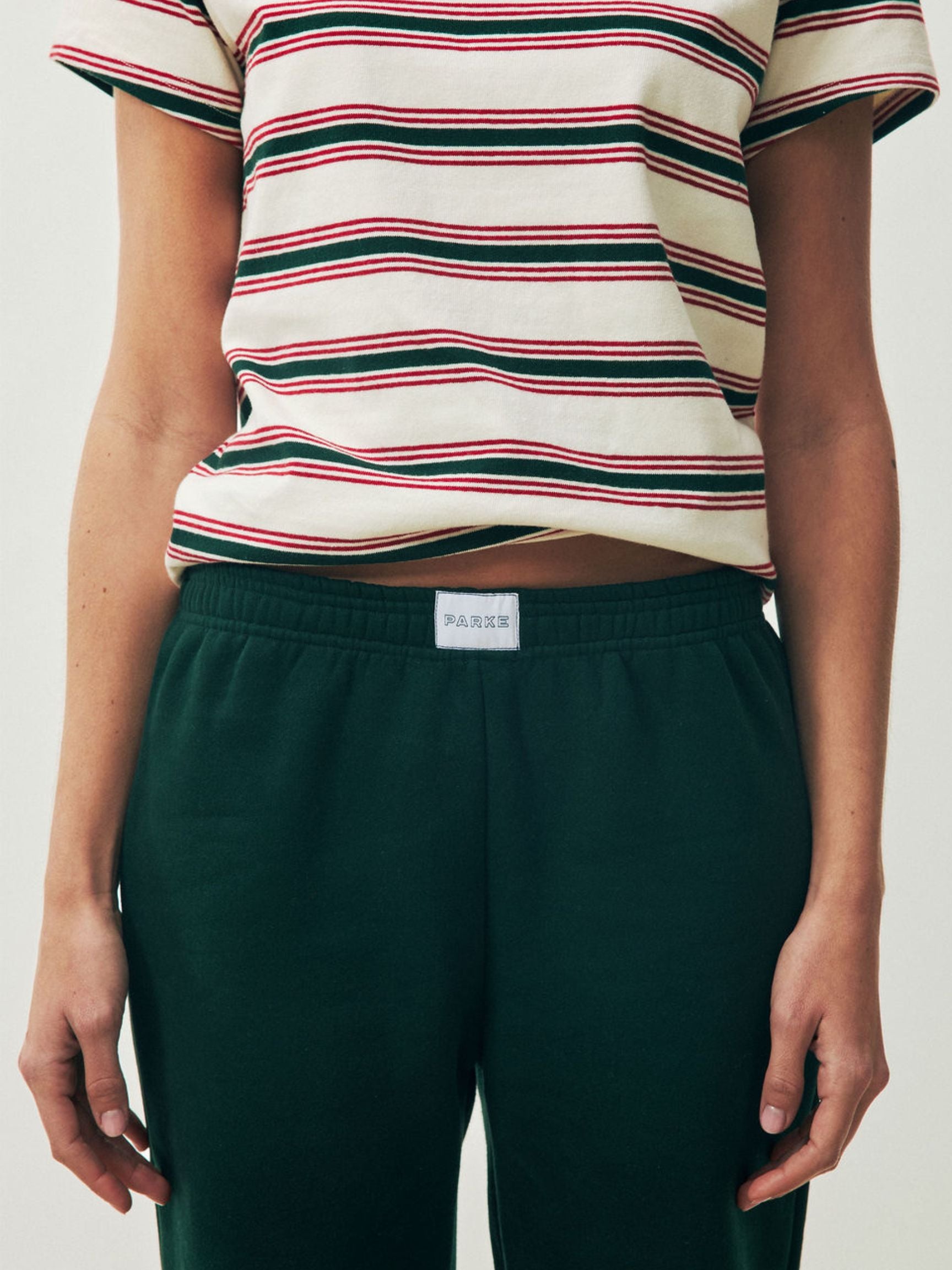 girl wearing Holiday Boxer Sweatpants -forest