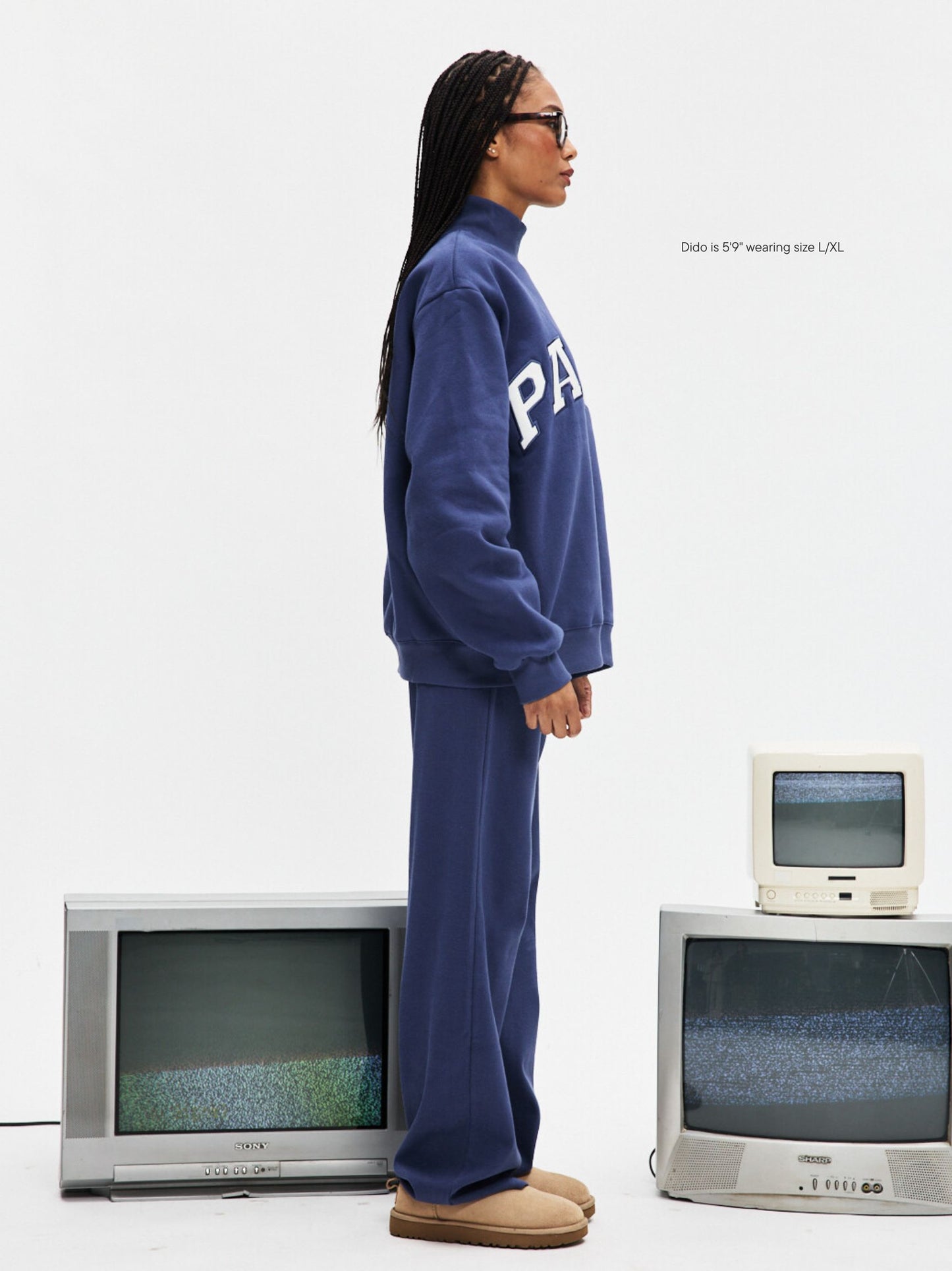 girl wearing Varsity Turtleneck -crown + white