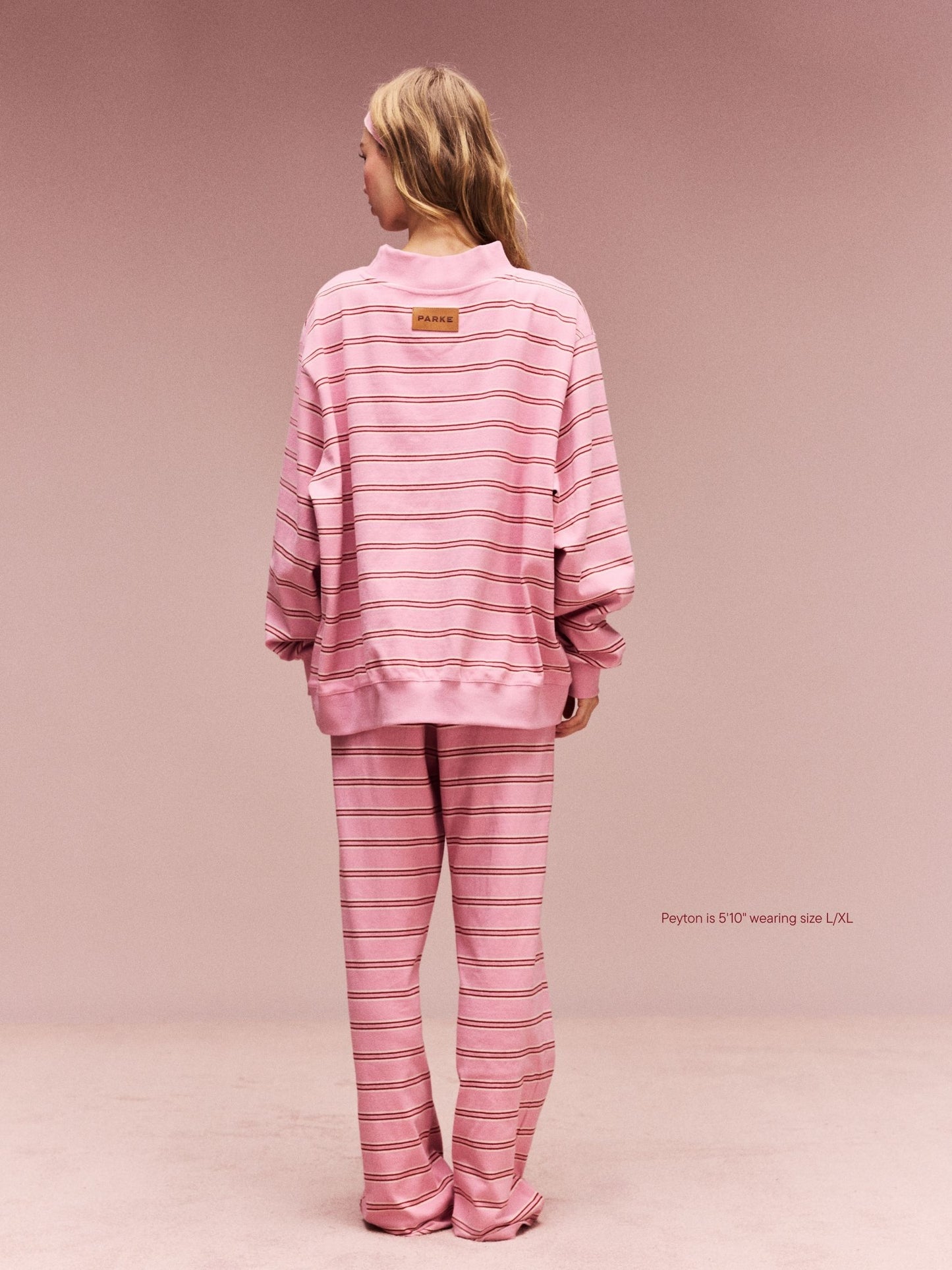 girl wearing Striped Mockneck Pullover -sweetheart stripe