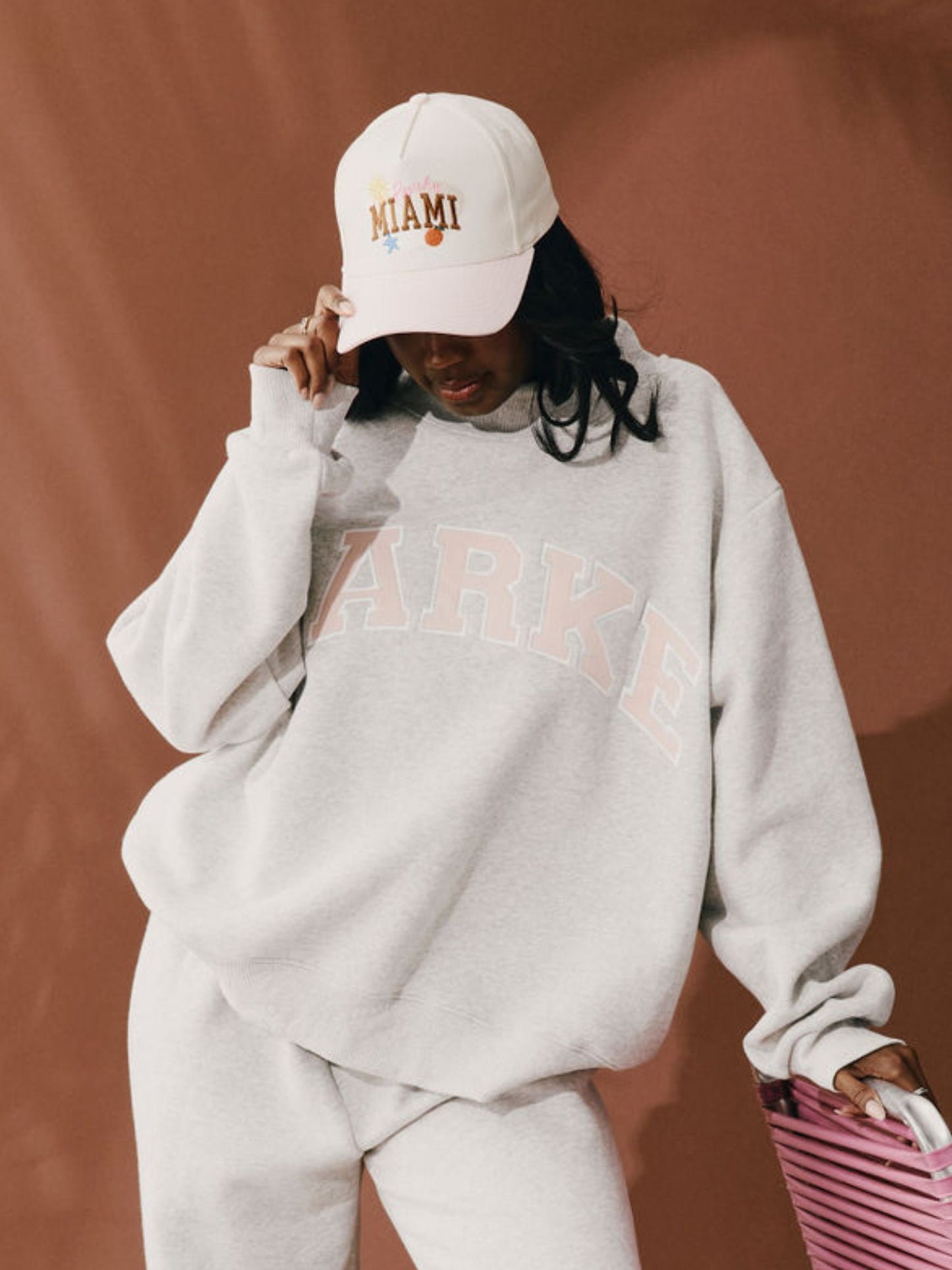 girl wearing Cities Hat Miami -taffy