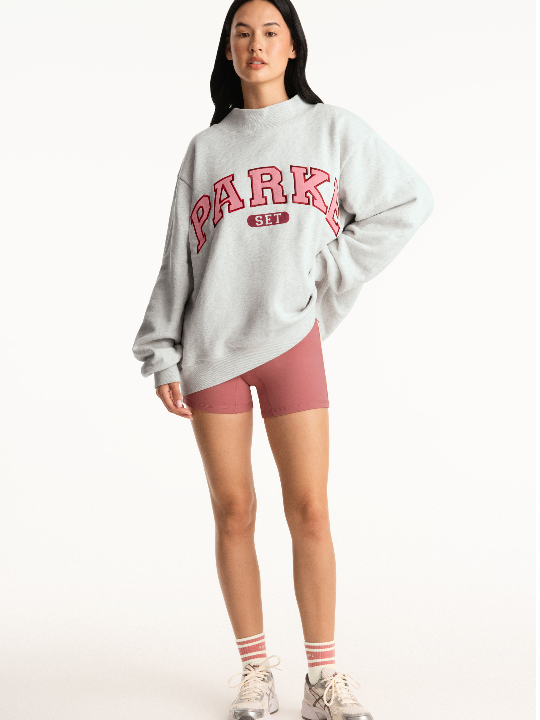girl wearing Parke x SET Varsity Mockneck -baked