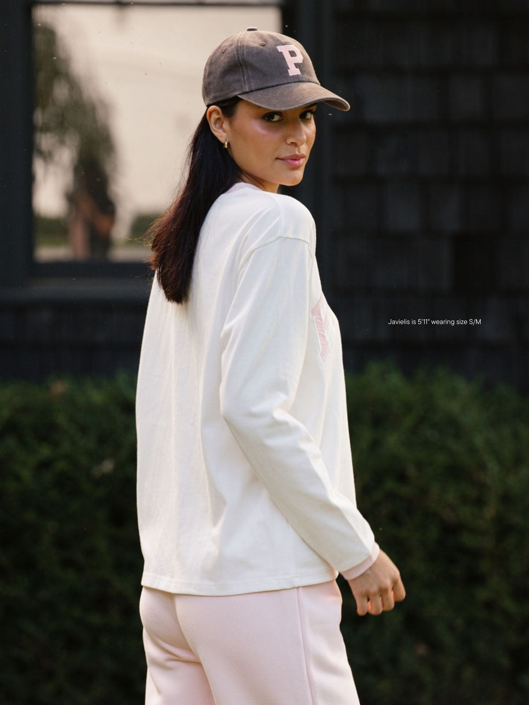 girl wearing varsity long sleeve-rose