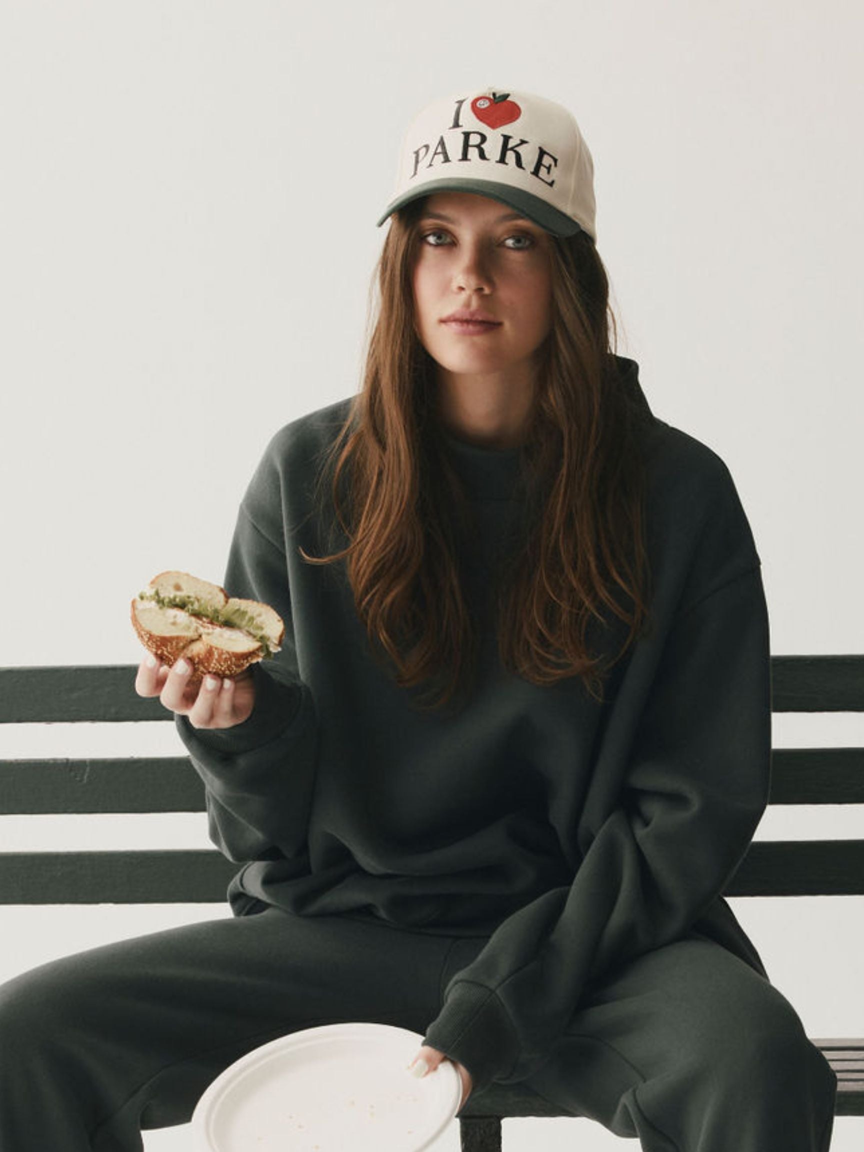 girl wearing Cities Hat New York -cedar