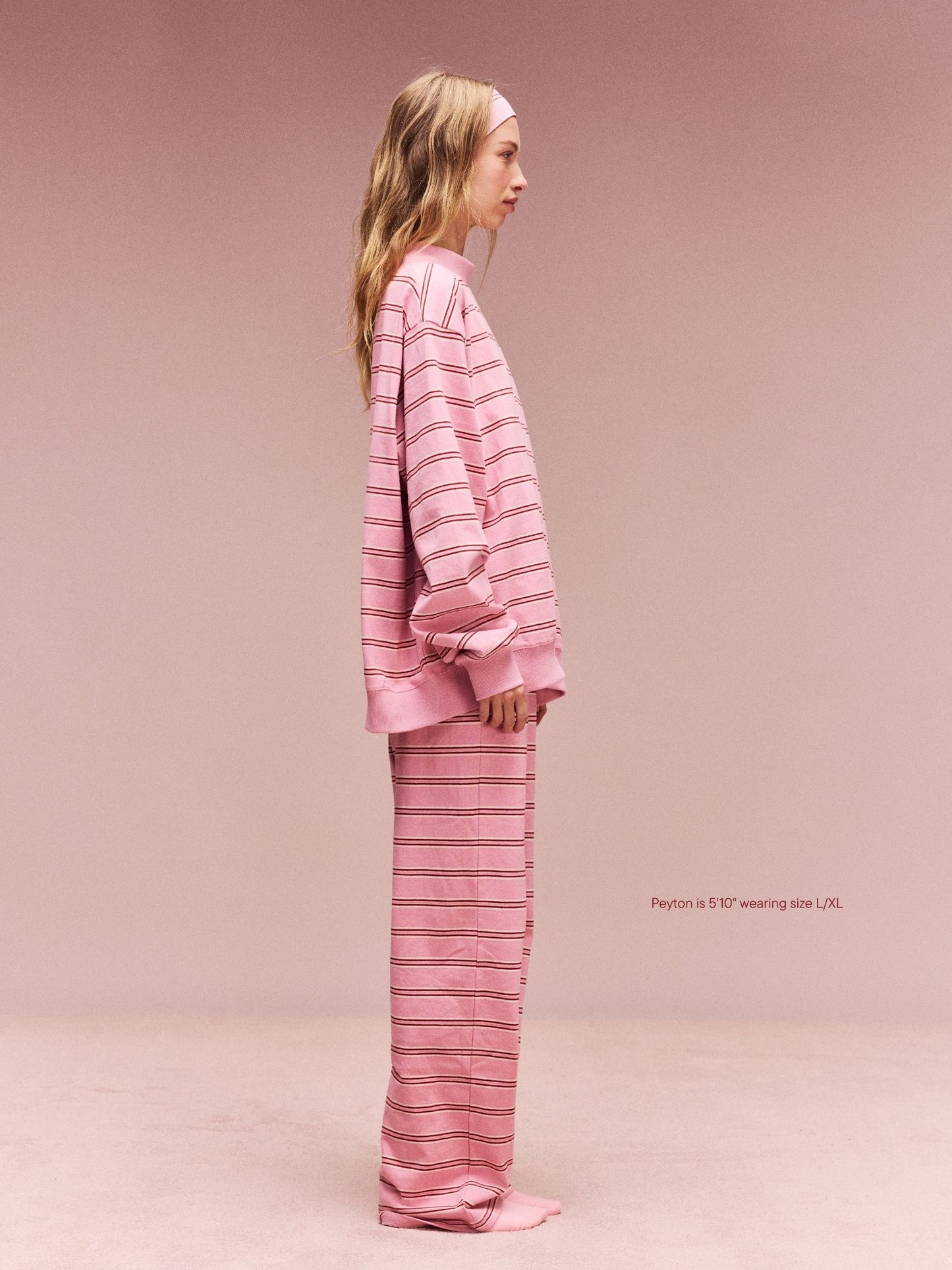 girl wearing Striped Mockneck Pullover -sweetheart stripe