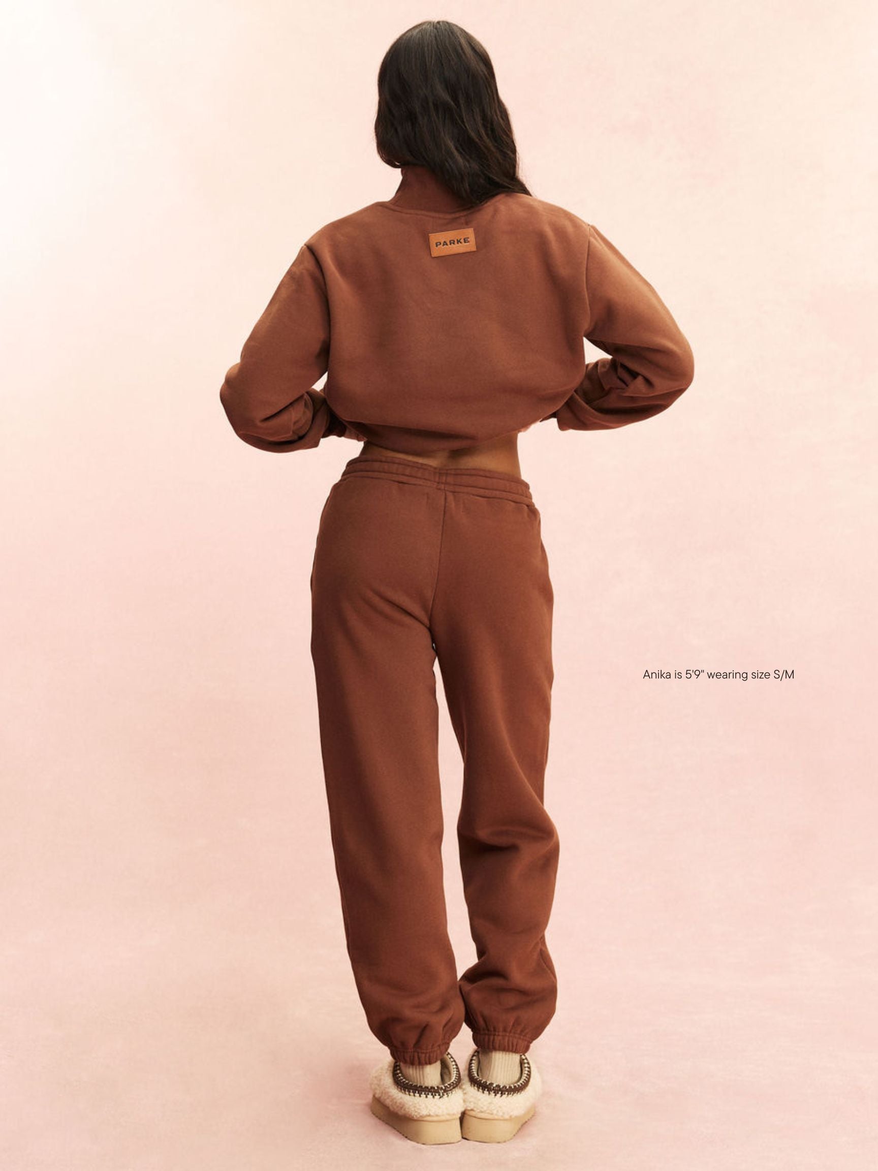 girl wearing Tonal Drawstring Unisex Sweatpants -mocha