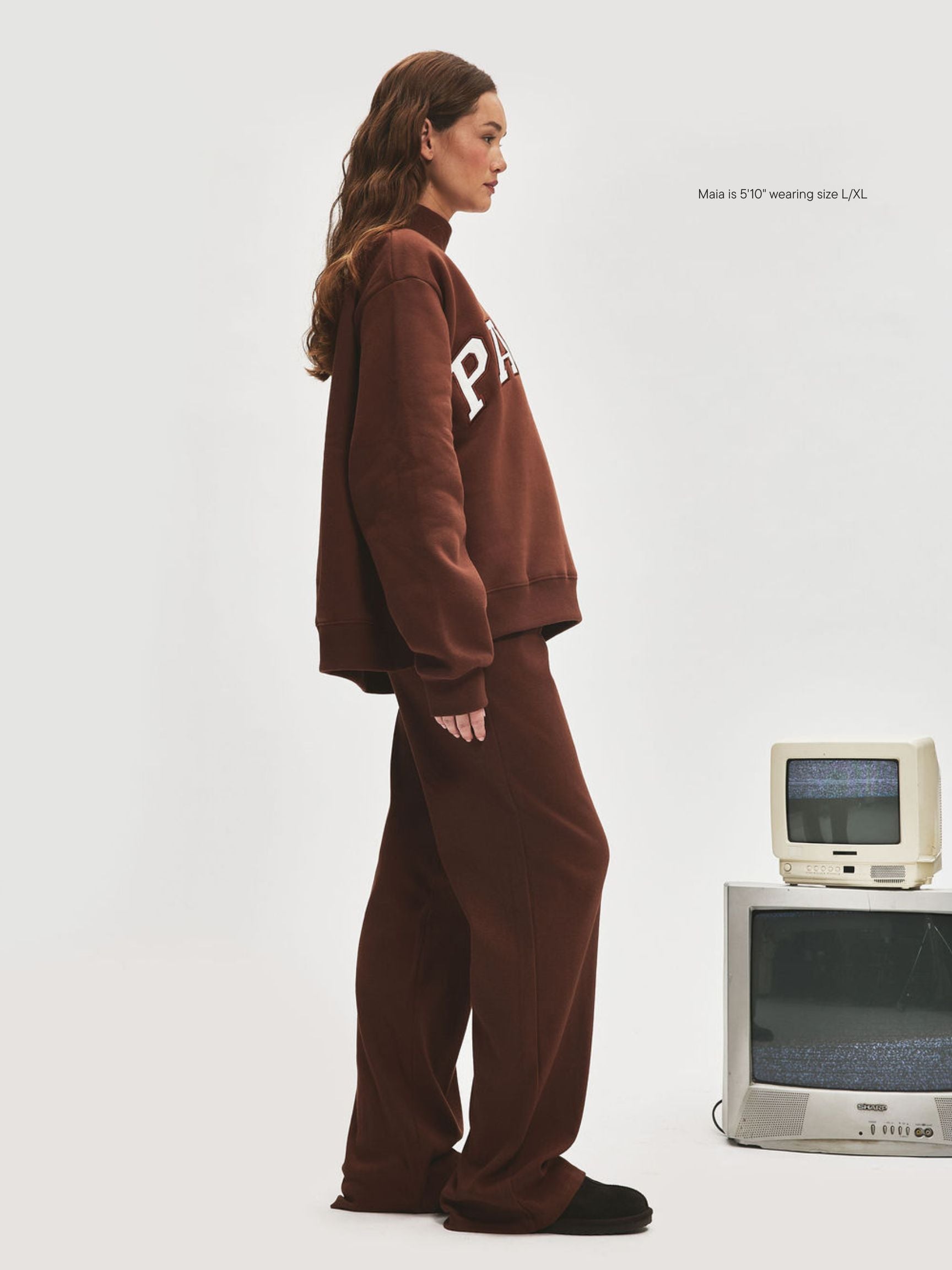 girl wearing Varsity Turtleneck -mocha + white