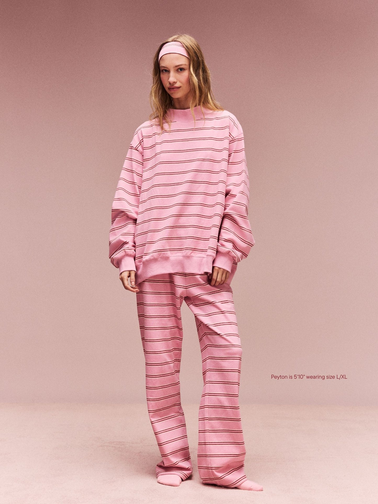 girl wearing Striped Mockneck Pullover -sweetheart stripe