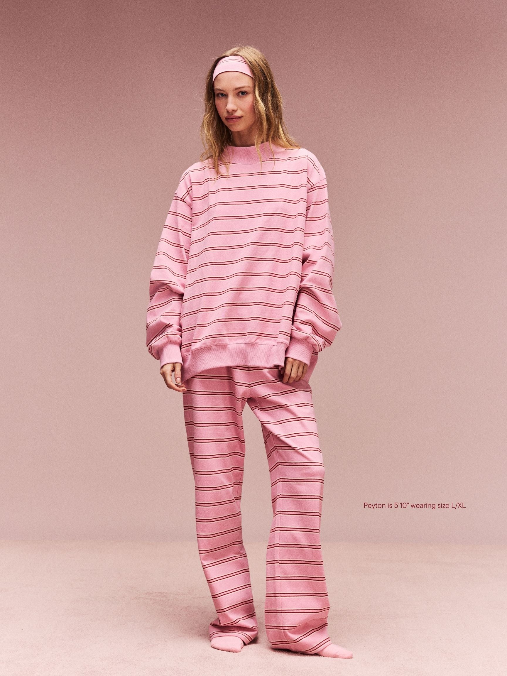 girl wearing Striped Mockneck Pullover -sweetheart stripe