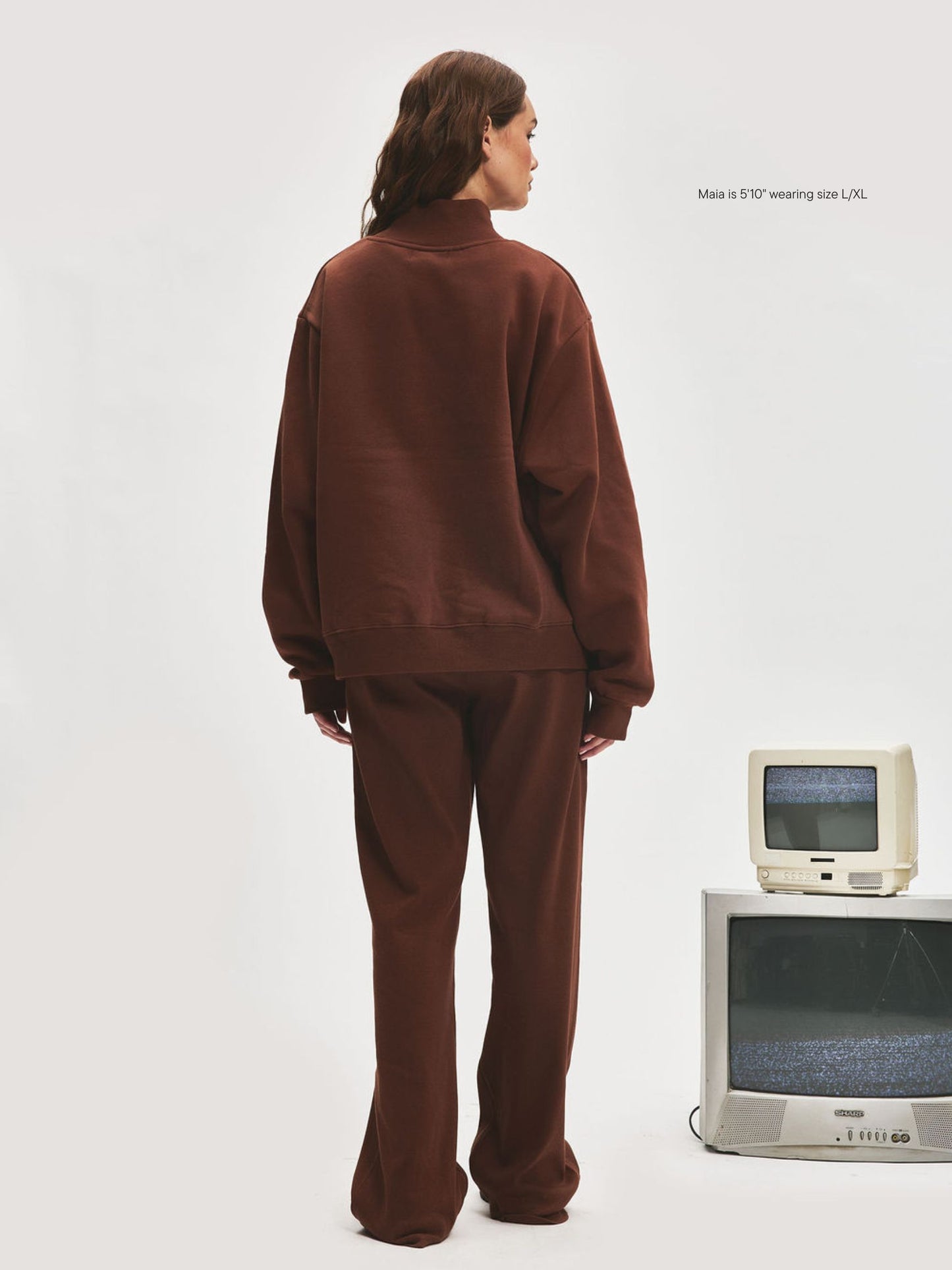 girl wearing Varsity Turtleneck -mocha + white