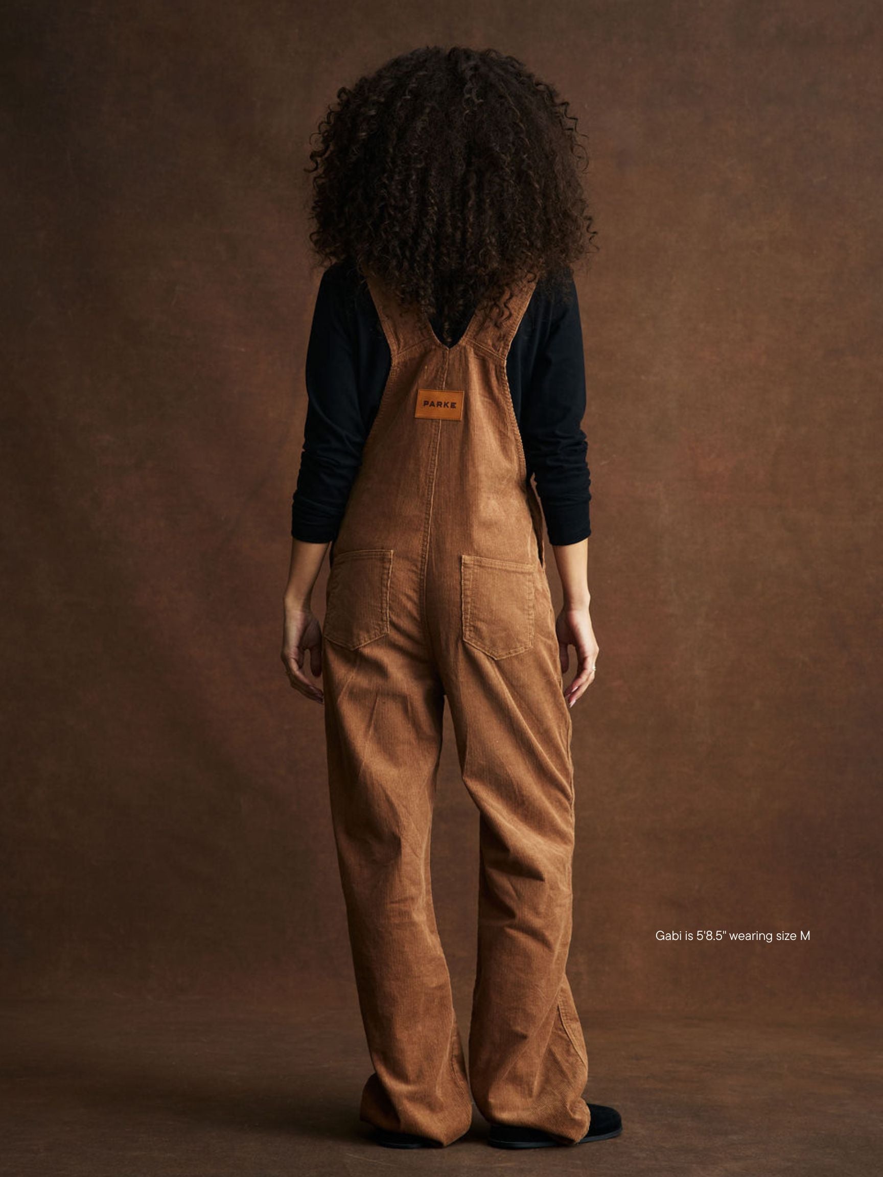 girl wearing Corduroy Overalls -caramel