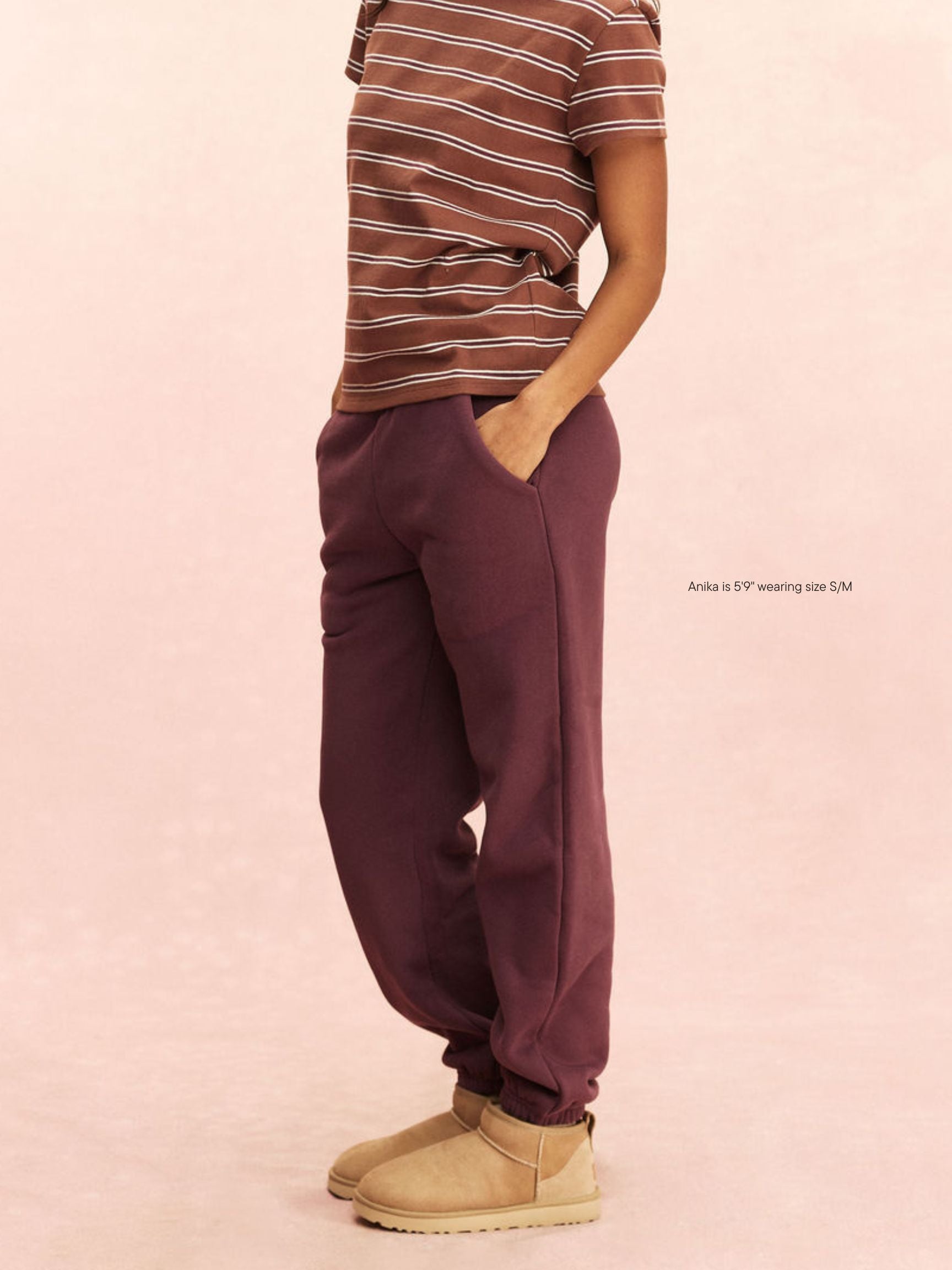 girl wearing Tonal Drawstring Unisex Sweatpants -eggplant