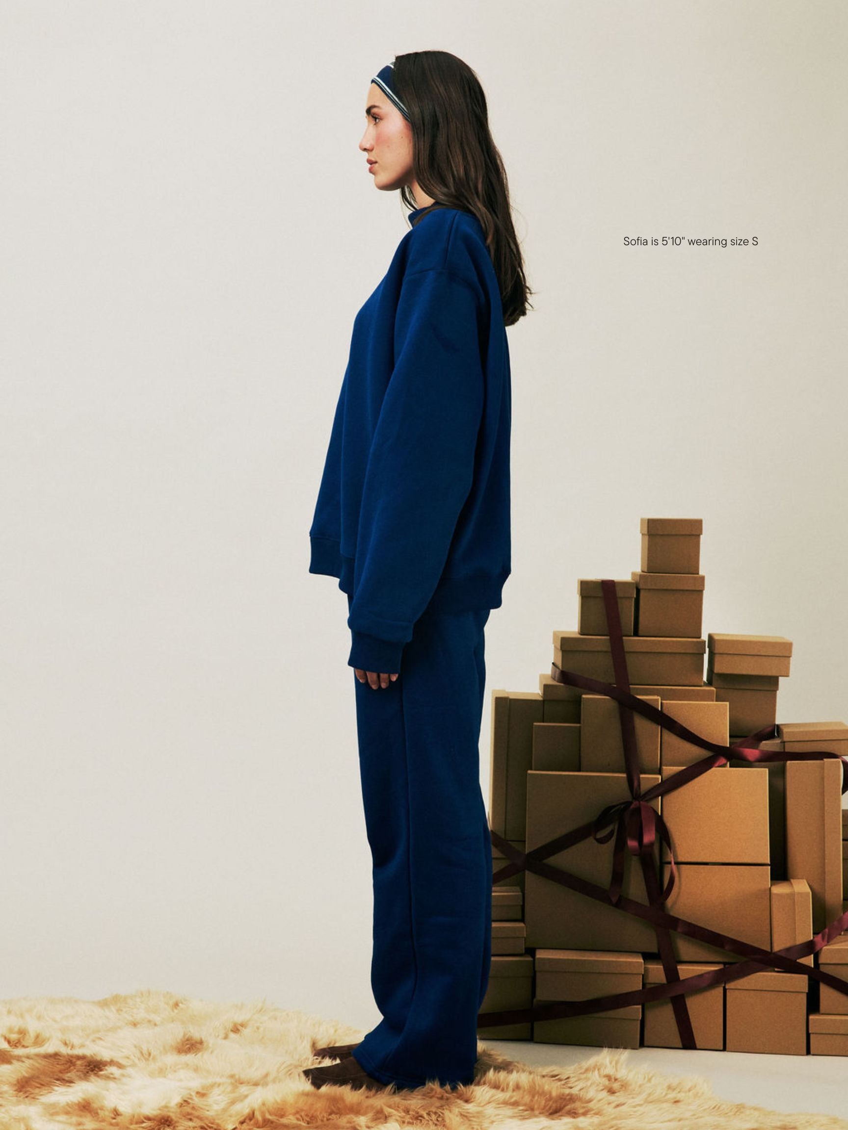 girl wearing Holiday Boxer Sweatpants -winter berry