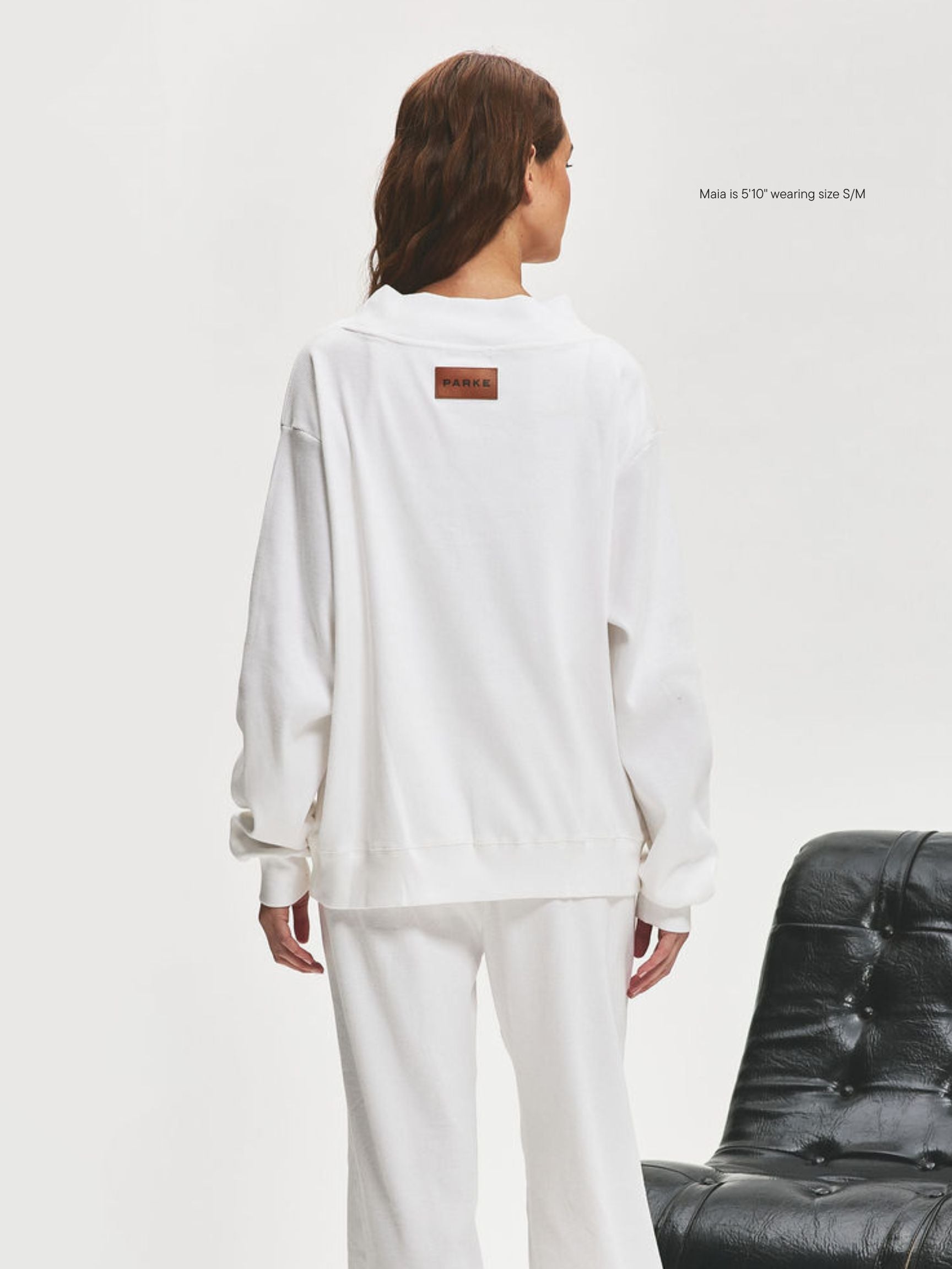 girl wearing Ribbed Pullover -white