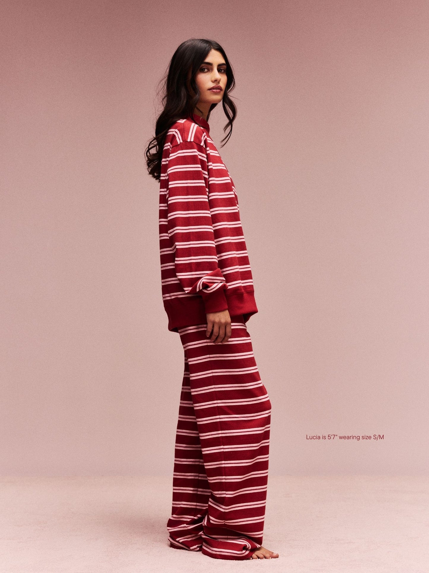 girl wearing Striped Mockneck Pullover -amour stripe