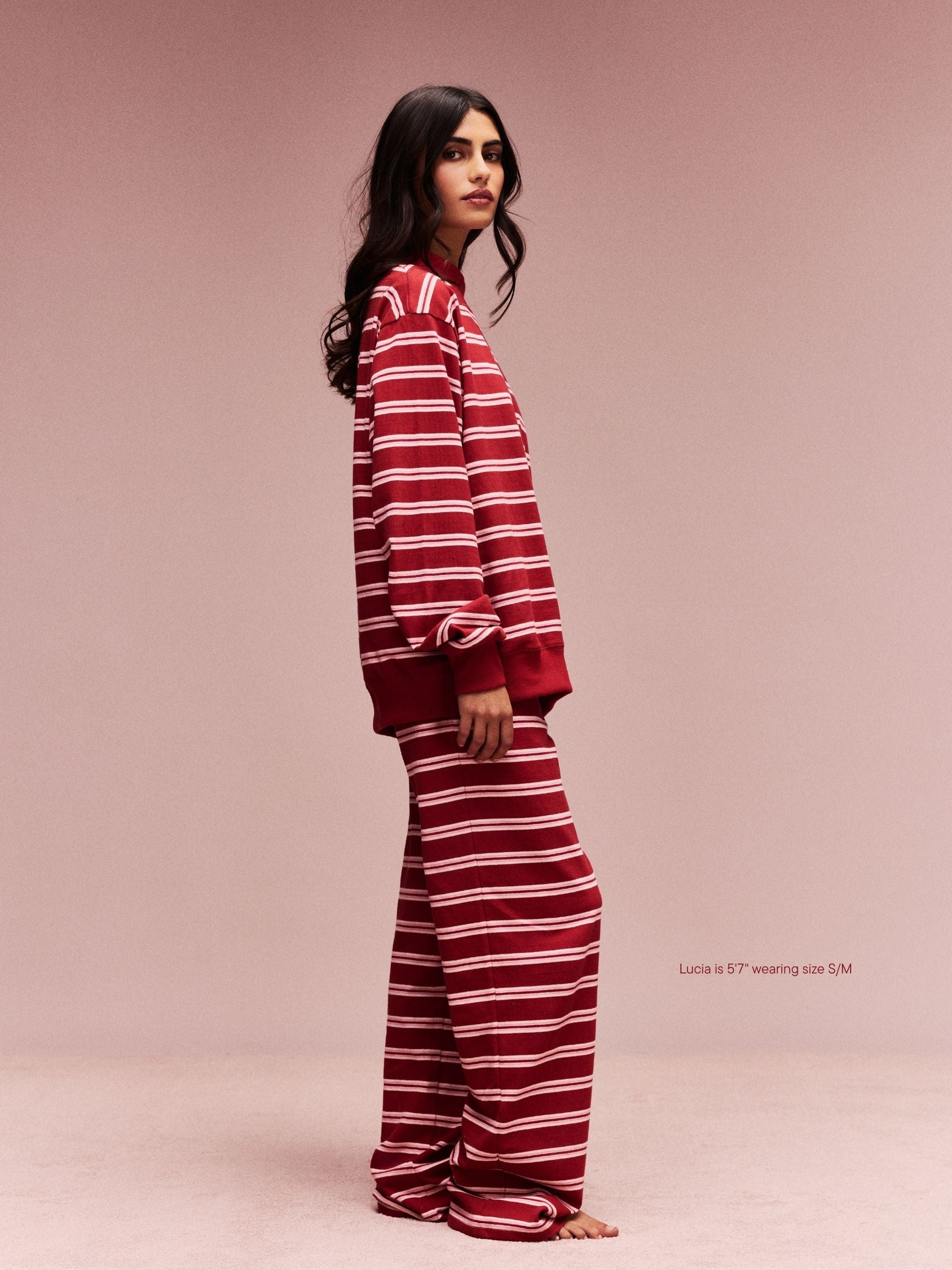 girl wearing Striped Mockneck Pullover -amour stripe