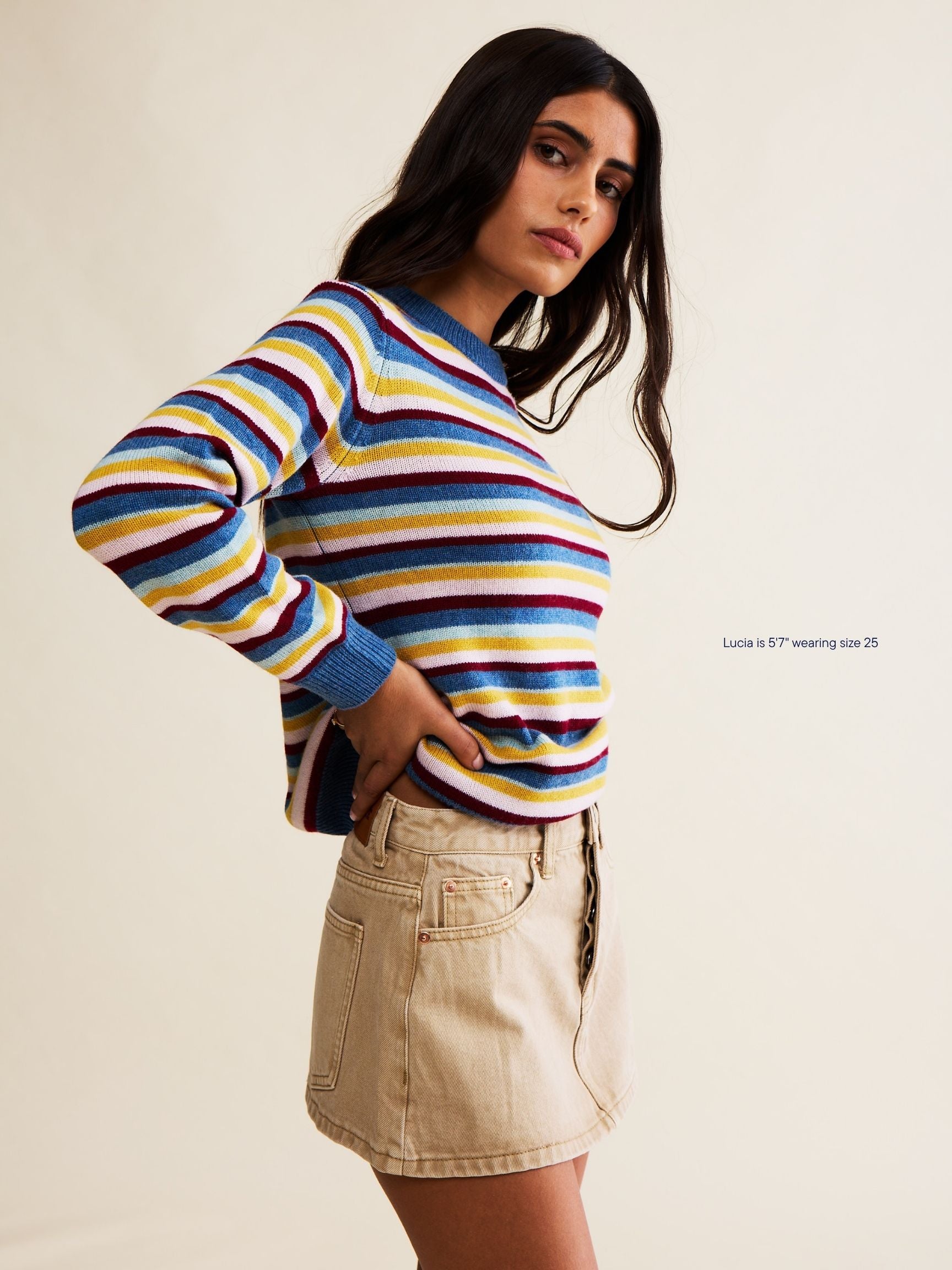 girl wearing denim mini skirt -camel