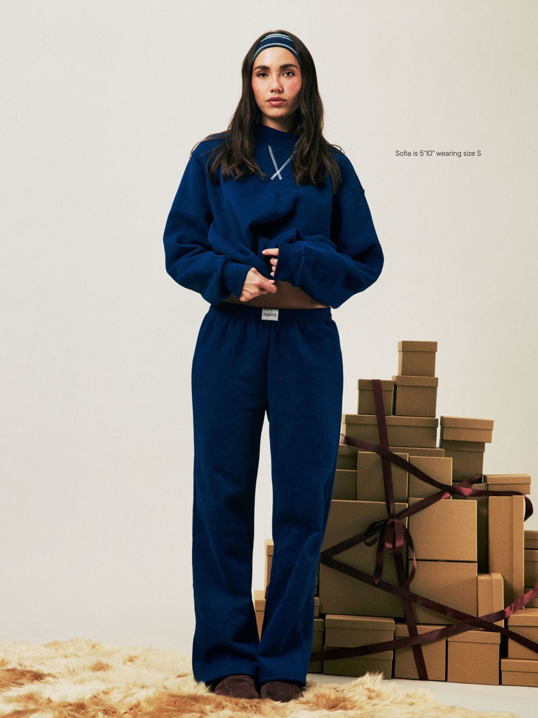 girl wearing Holiday Boxer Sweatpants -winter berry