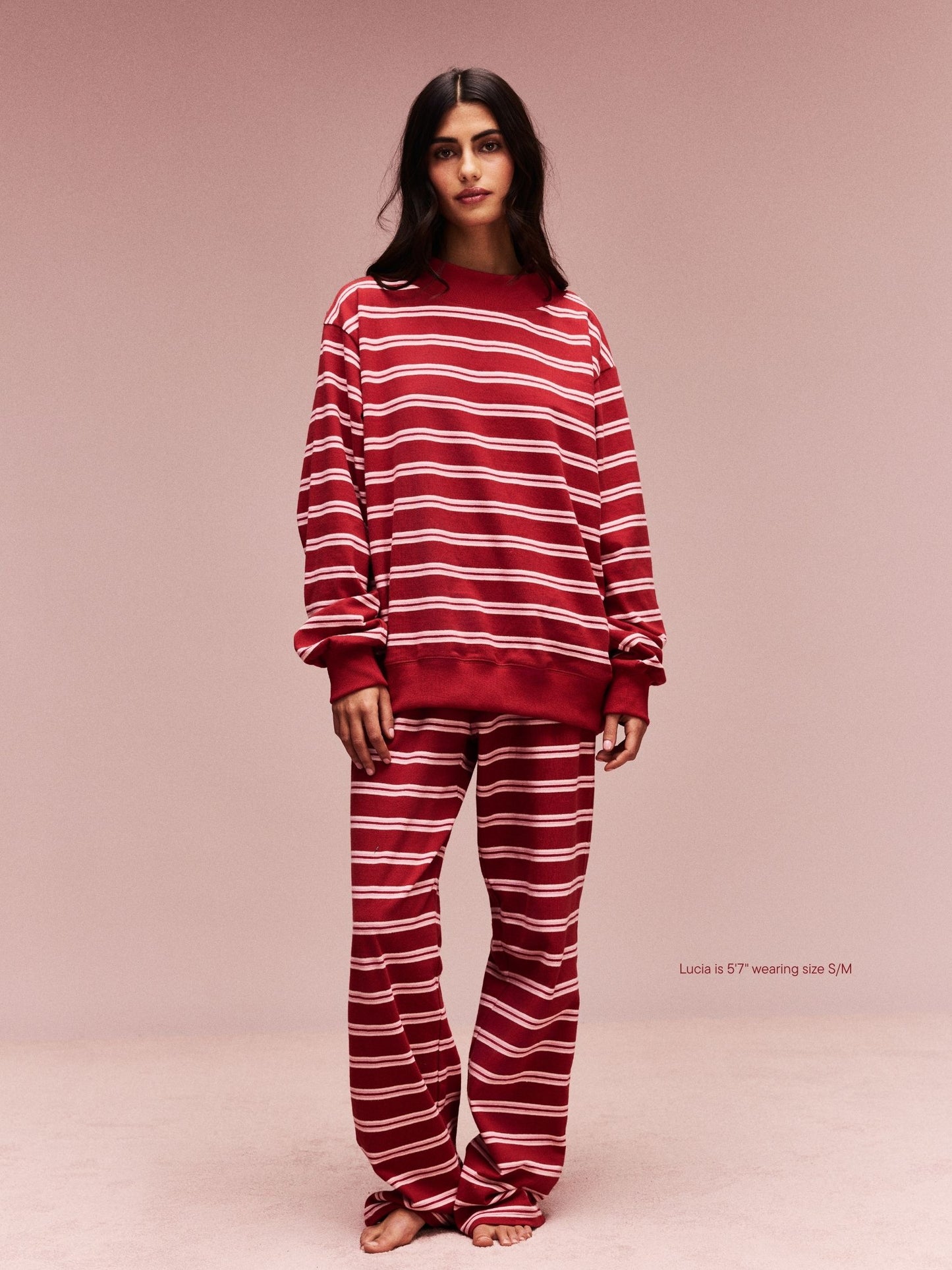 girl wearing Striped Mockneck Pullover -amour stripe