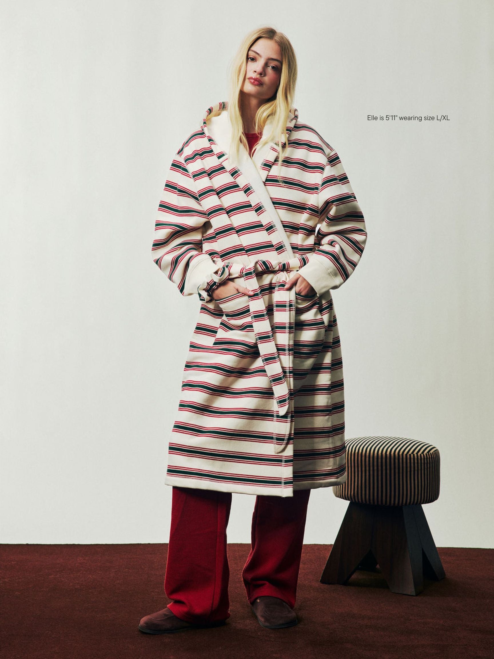 girl wearing Holiday Robe -eggnog stripe 