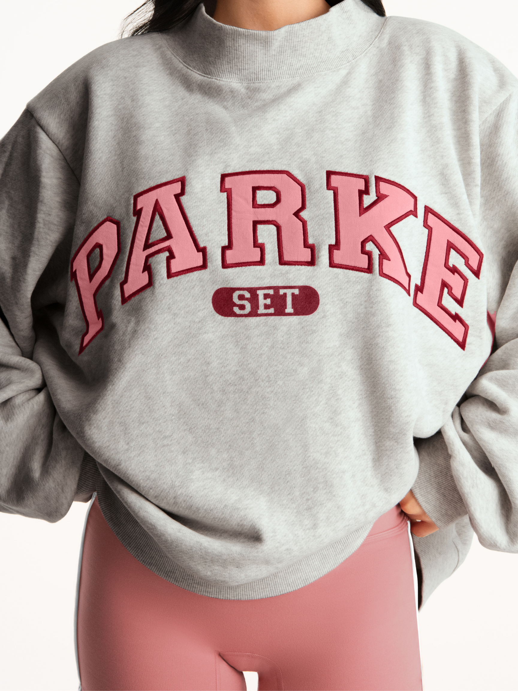 girl wearing Parke x SET Varsity Mockneck -baked
