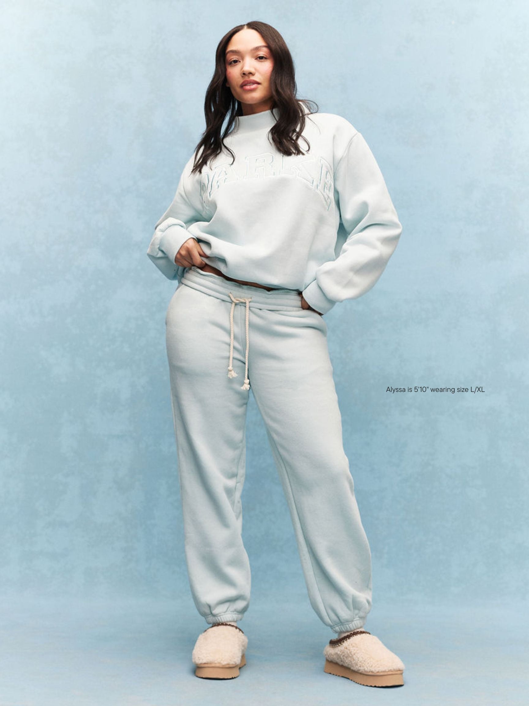 girl wearing Tonal Drawstring Unisex Sweatpants -arctic