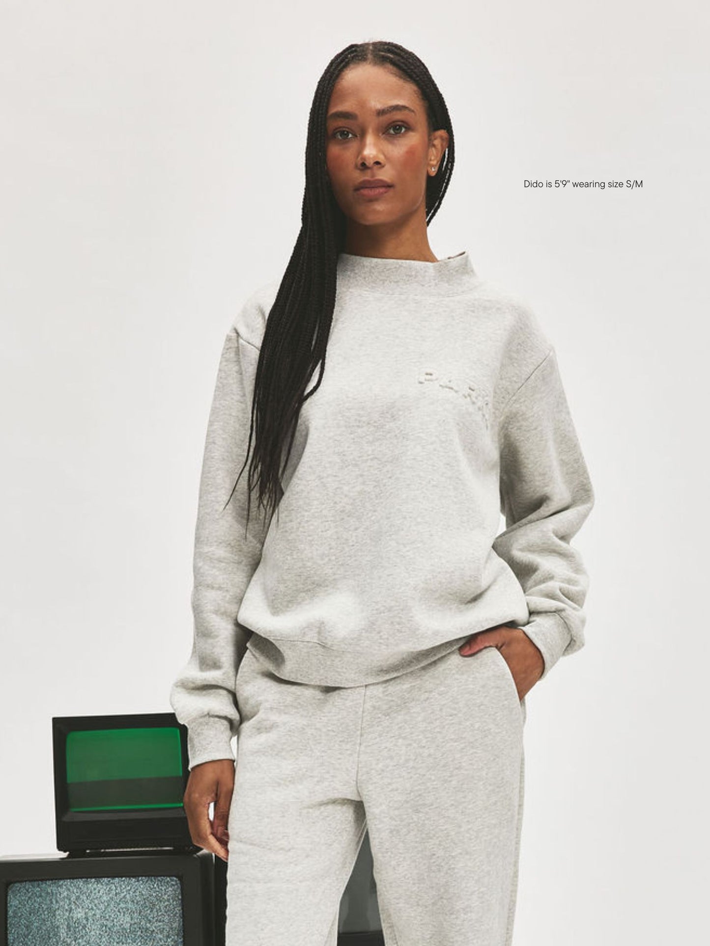 girl wearing Embossed Mockneck -classic grey