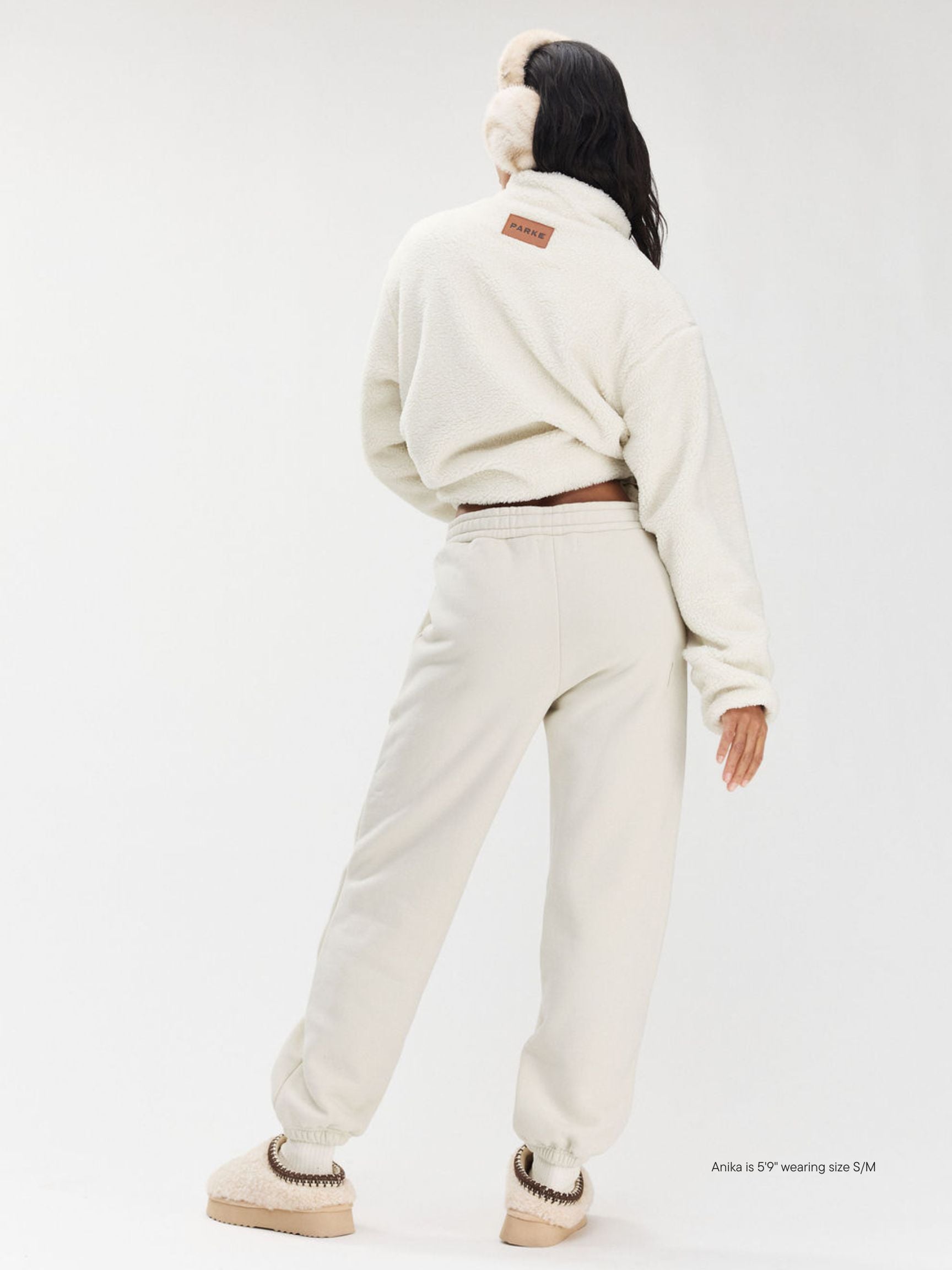 girl wearing Tonal Drawstring Unisex Sweatpants -oat