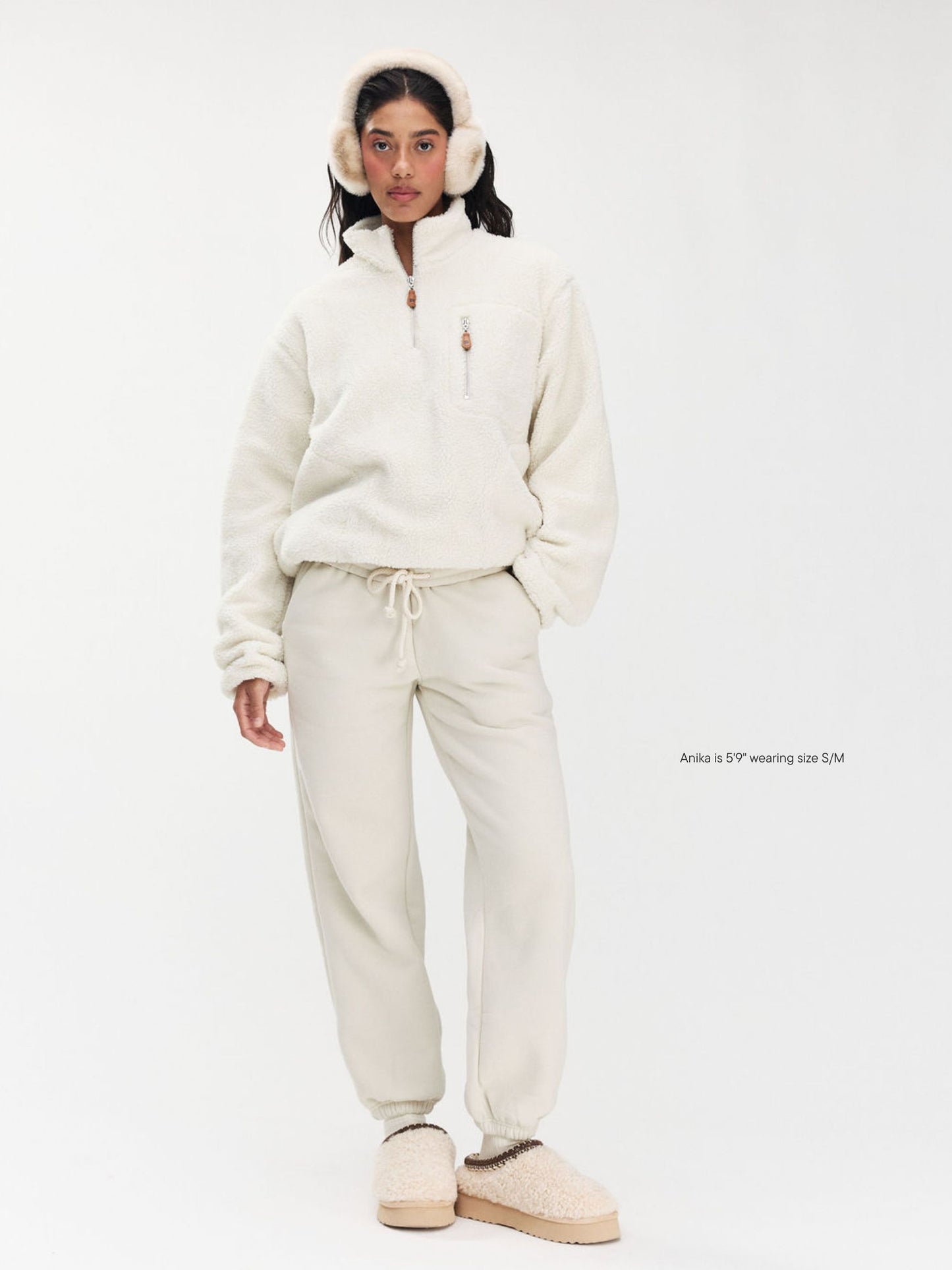 girl wearing Tonal Drawstring Unisex Sweatpants -oat