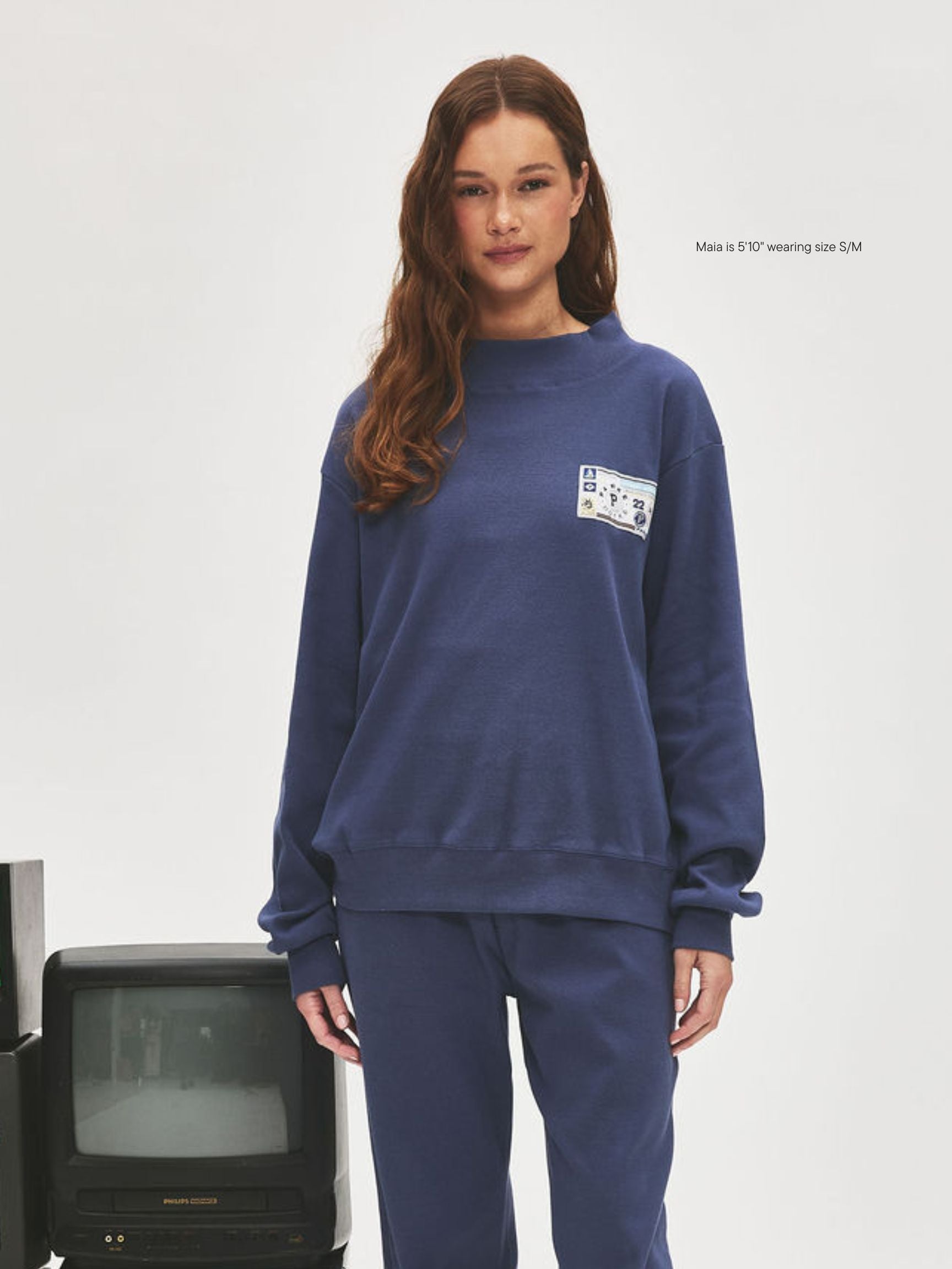 girl wearing Ribbed Pullover With Nostalgia Patch -crown