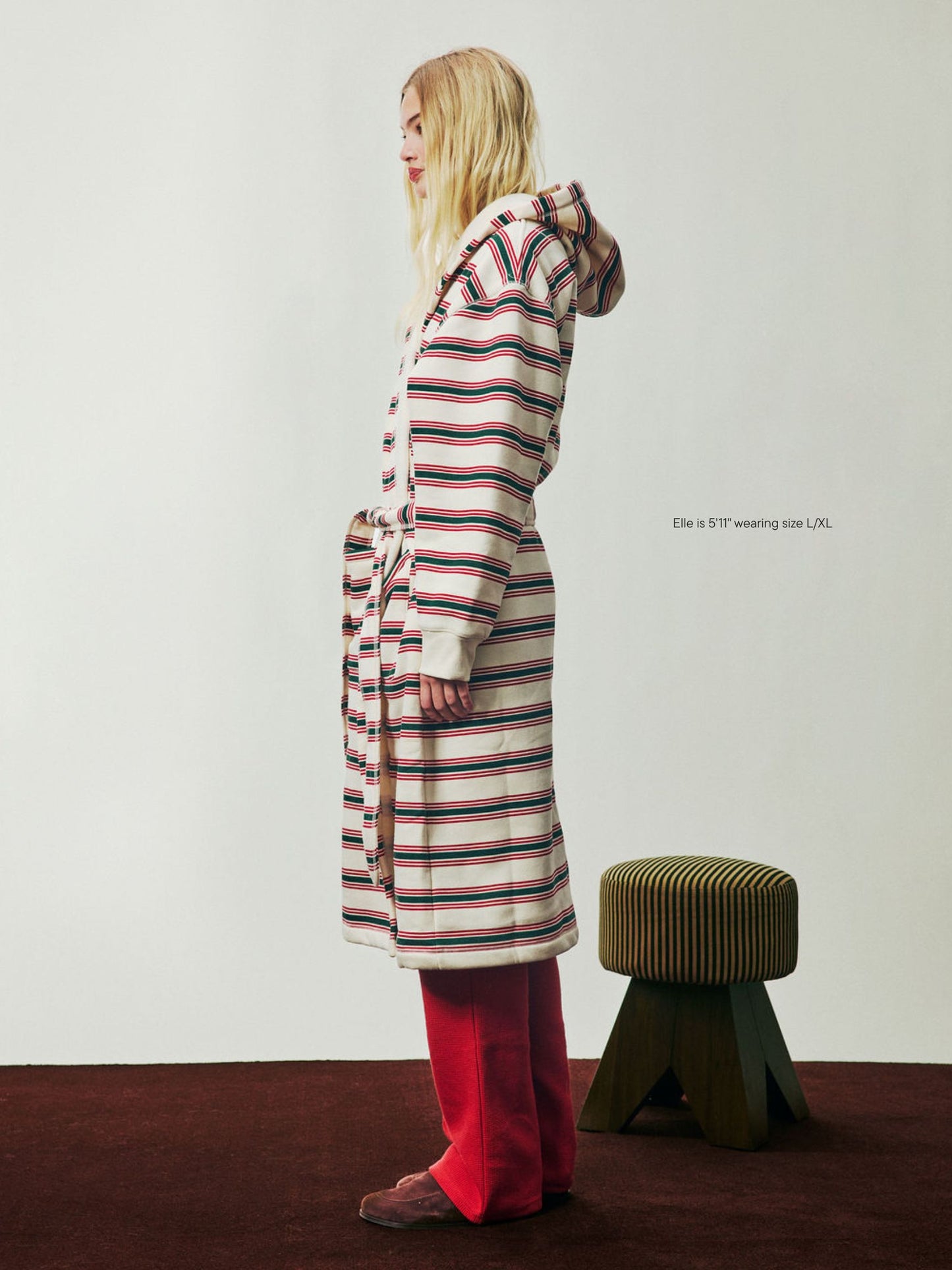 girl wearing Holiday Robe -eggnog stripe 