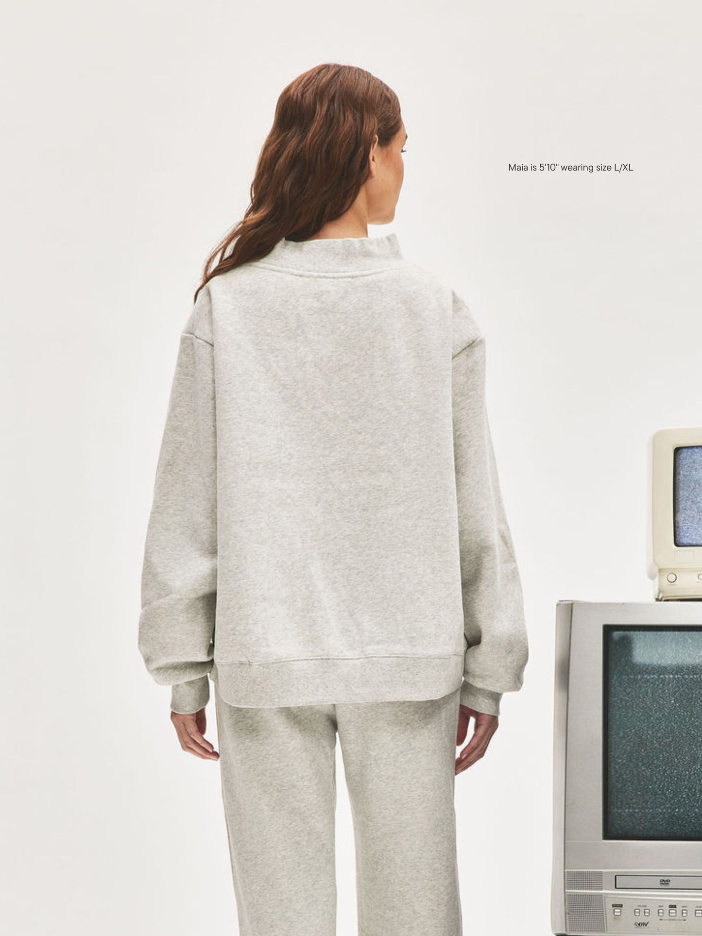 girl wearing Nostalgia Varsity Mockneck -classic grey + white 