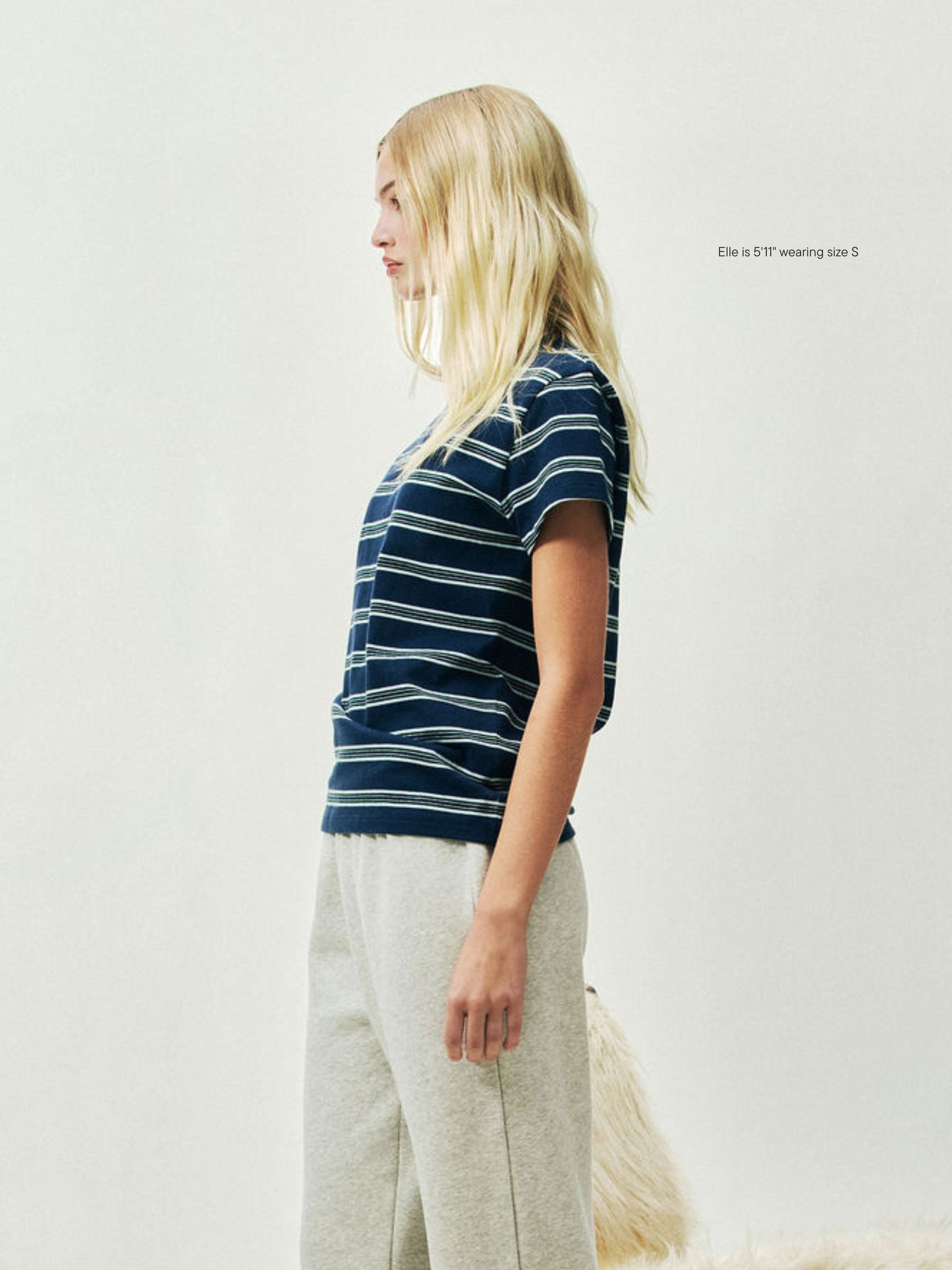 girl wearing Holiday Striped T-Shirt -snowflake stripe
