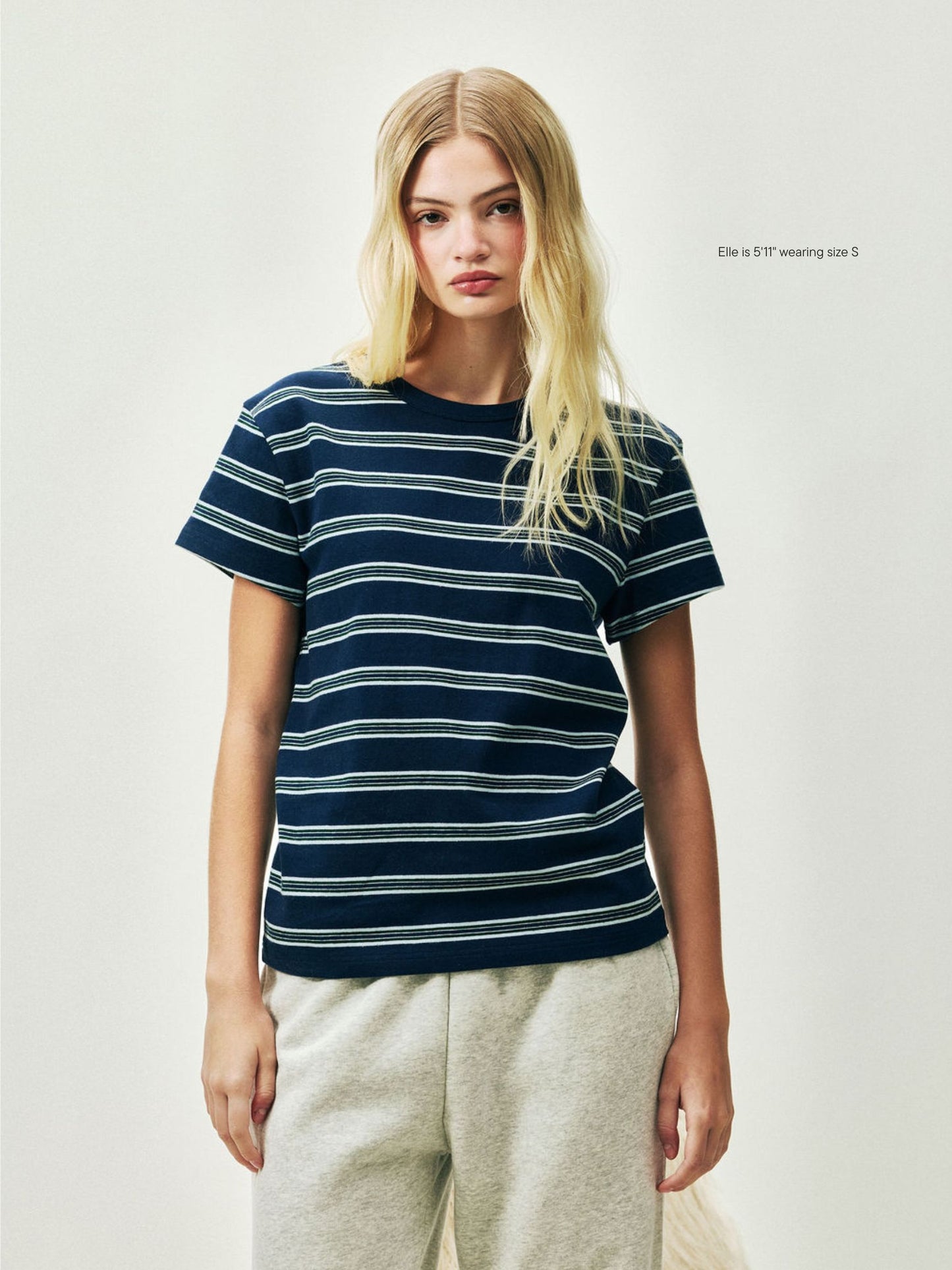 girl wearing Holiday Striped T-Shirt -snowflake stripe