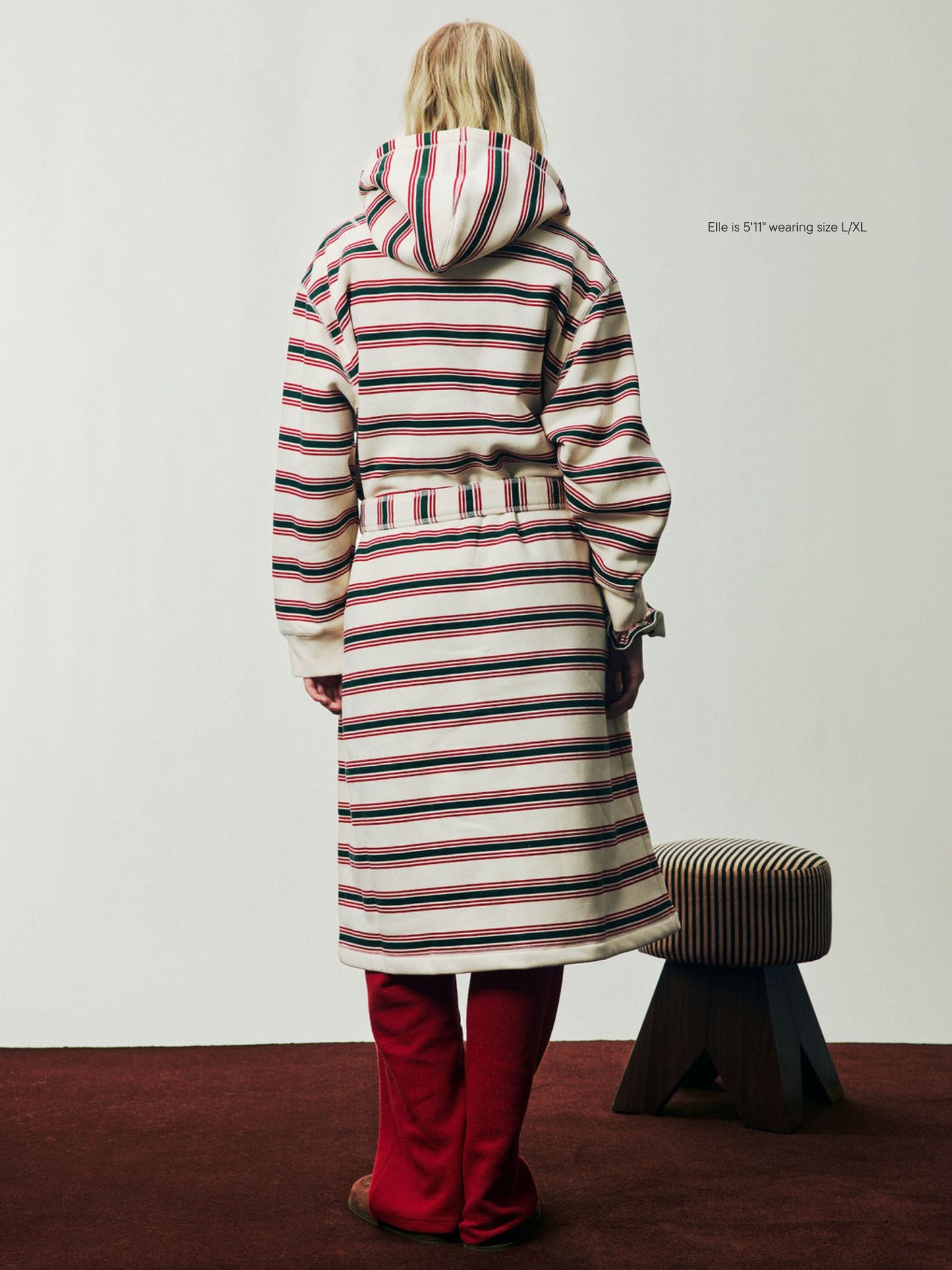 girl wearing Holiday Robe -eggnog stripe 