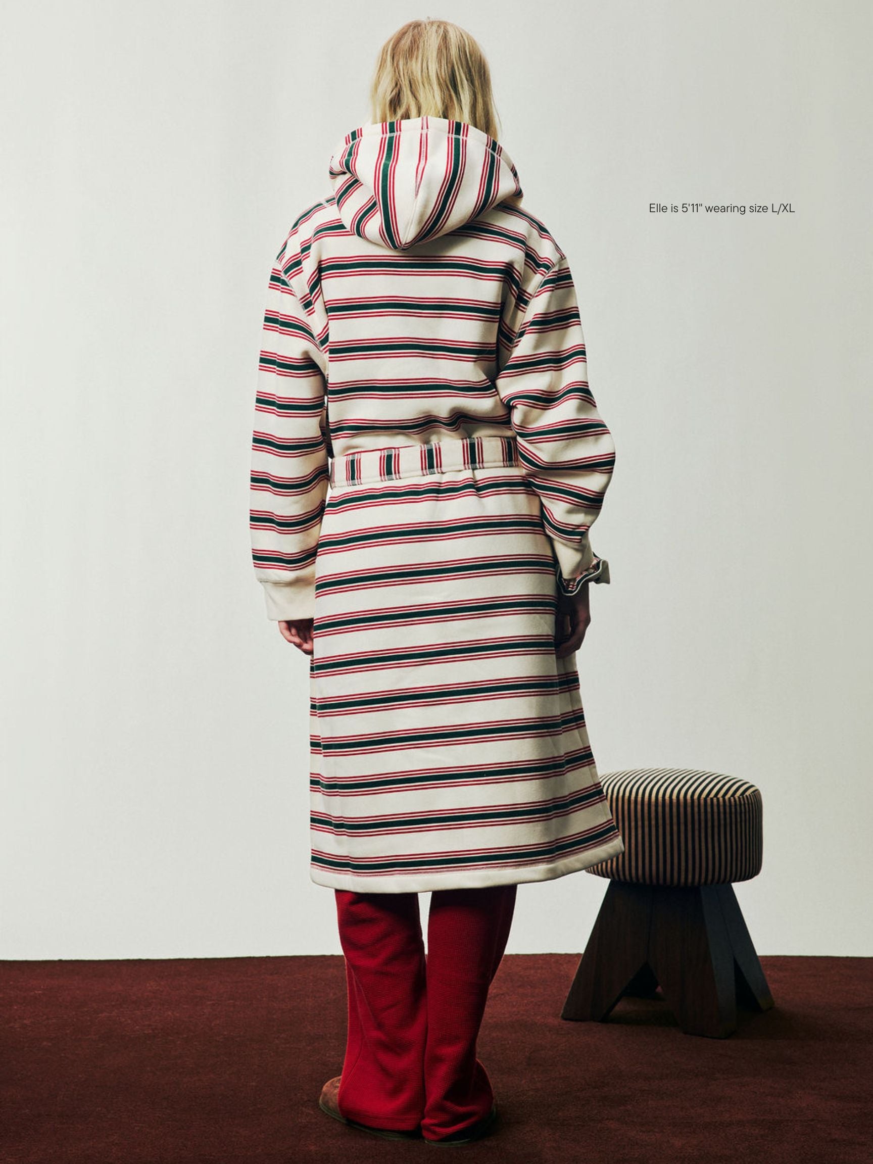 girl wearing Holiday Robe -eggnog stripe 
