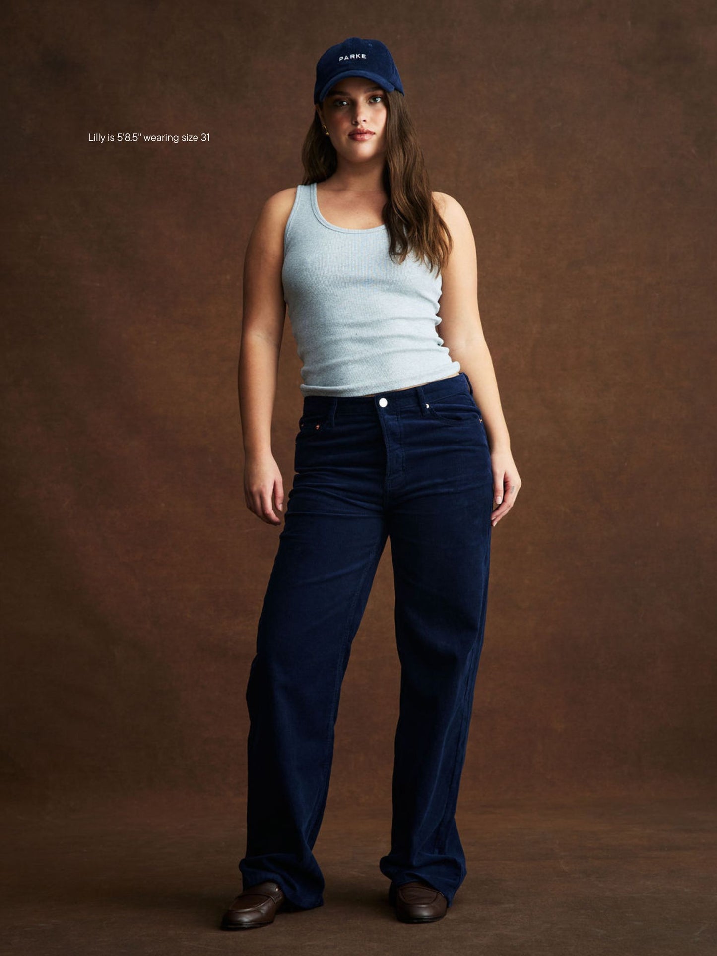 girl wearing Classic Straight Pants -navy corduroy