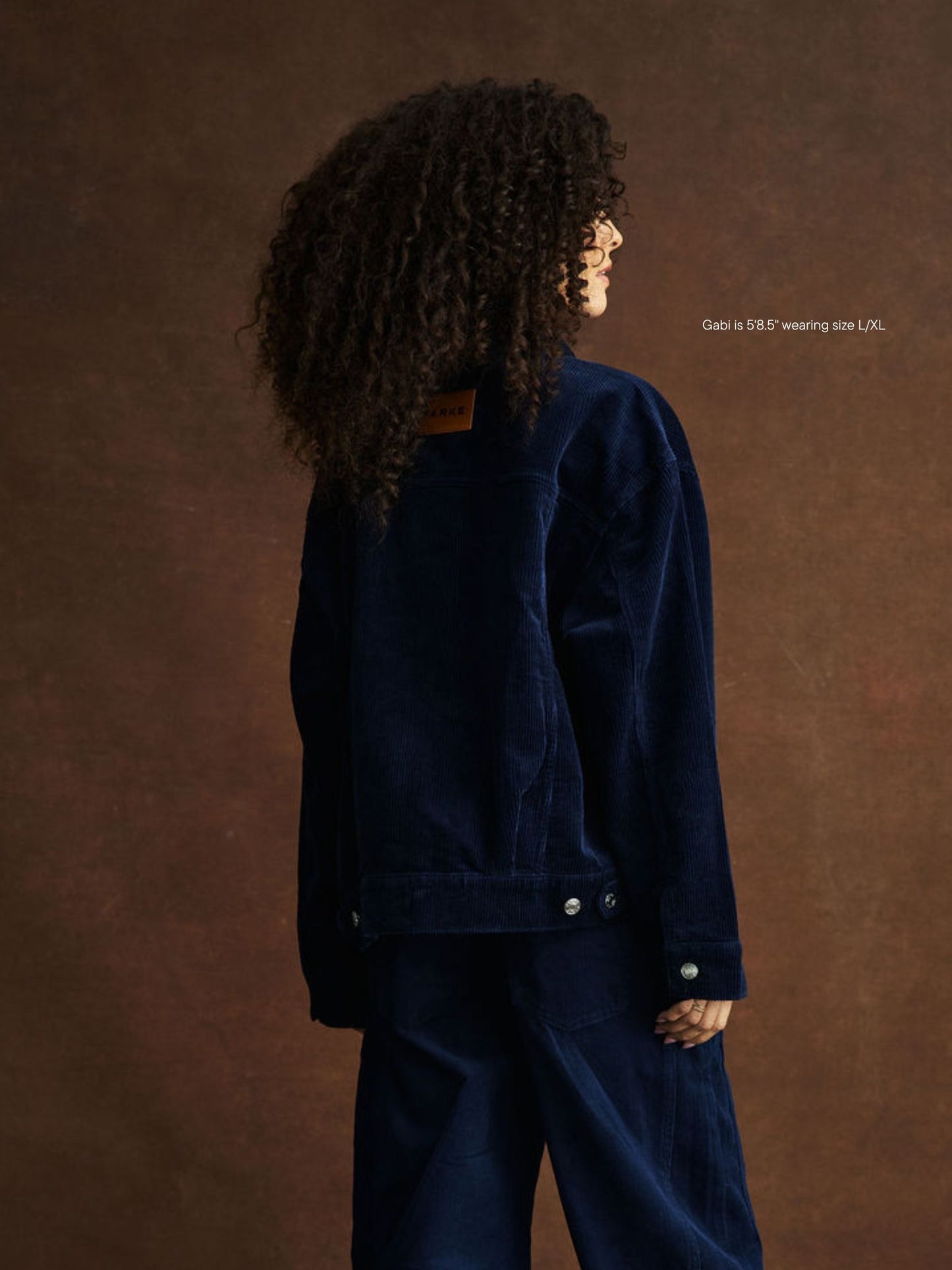 girl wearing Oversized Corduroy Jacket -navy corduroy
