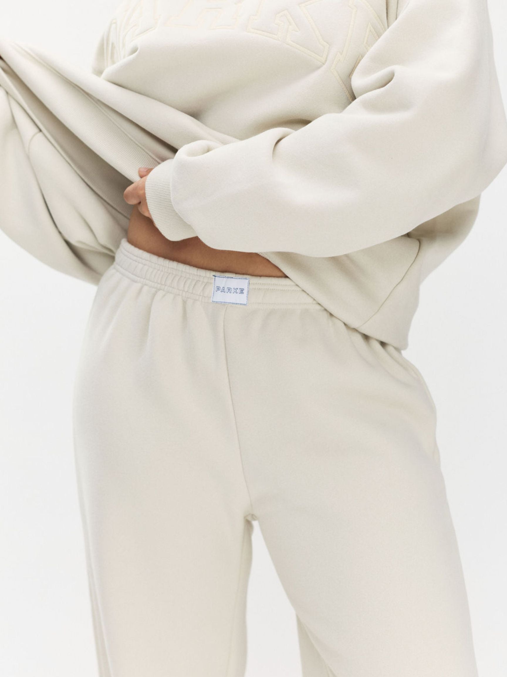 girl wearing Tonal Boxer Sweatpants -oat