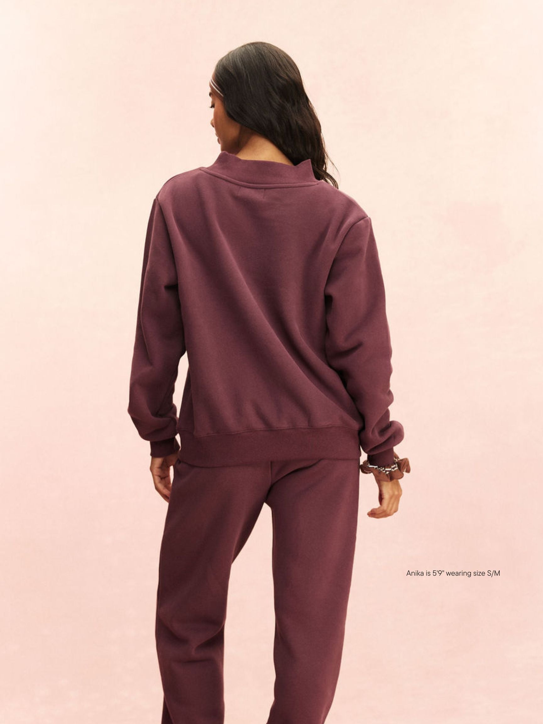 girl wearing Monochrome Varsity Mockneck -eggplant