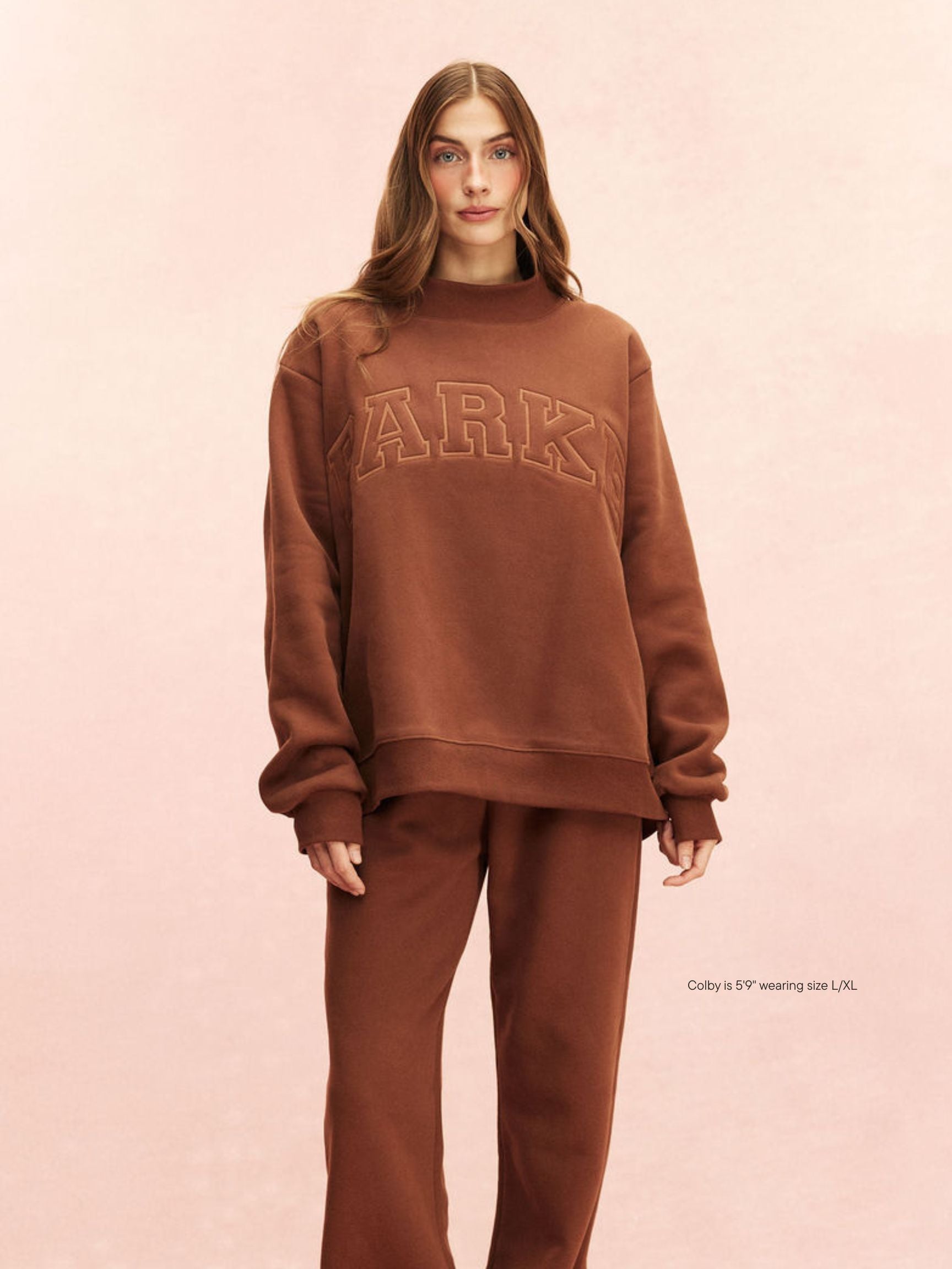 girl wearing Monochrome Varsity Mockneck -mocha