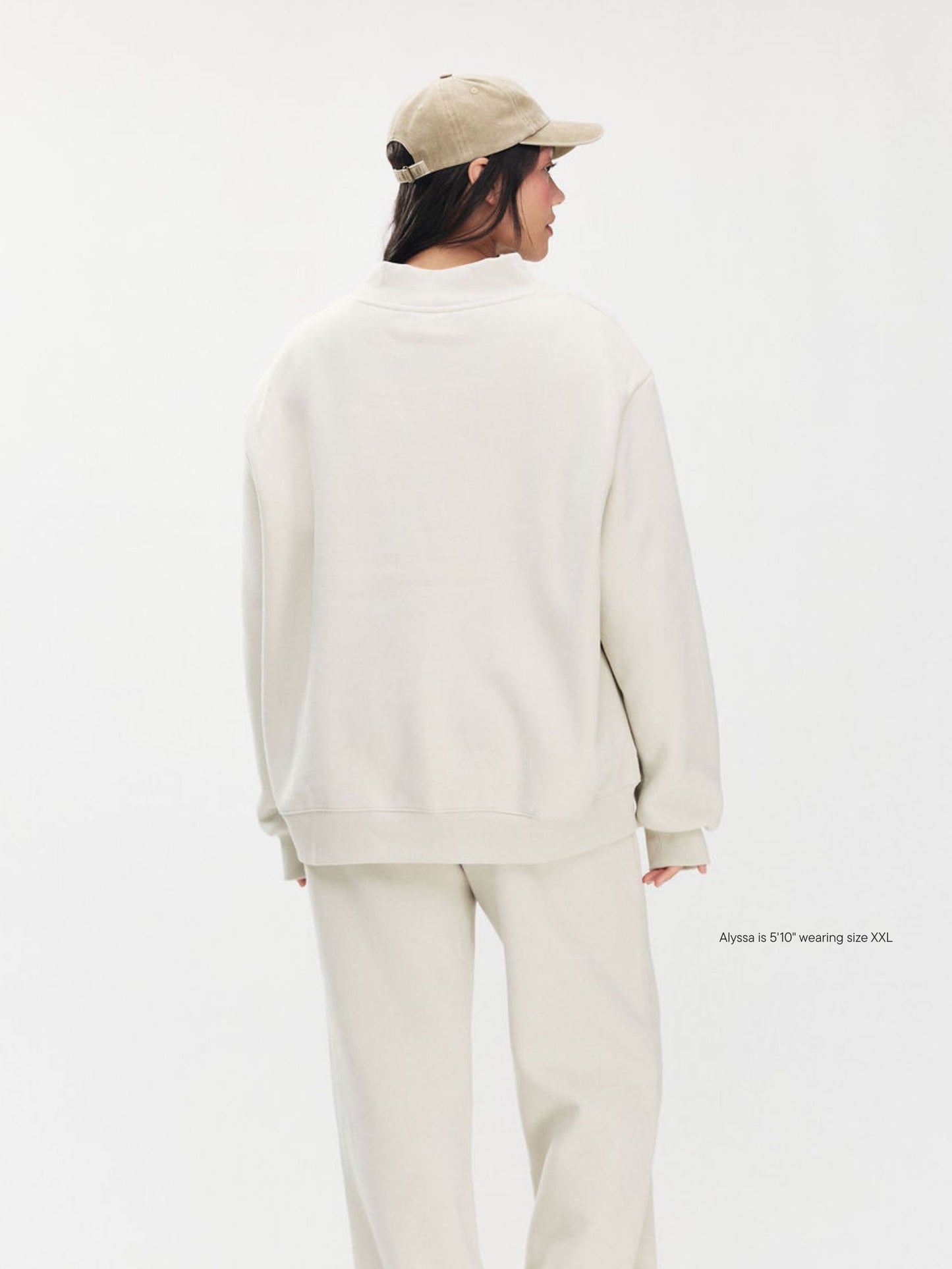 girl wearing Monochrome Varsity Mockneck -oat