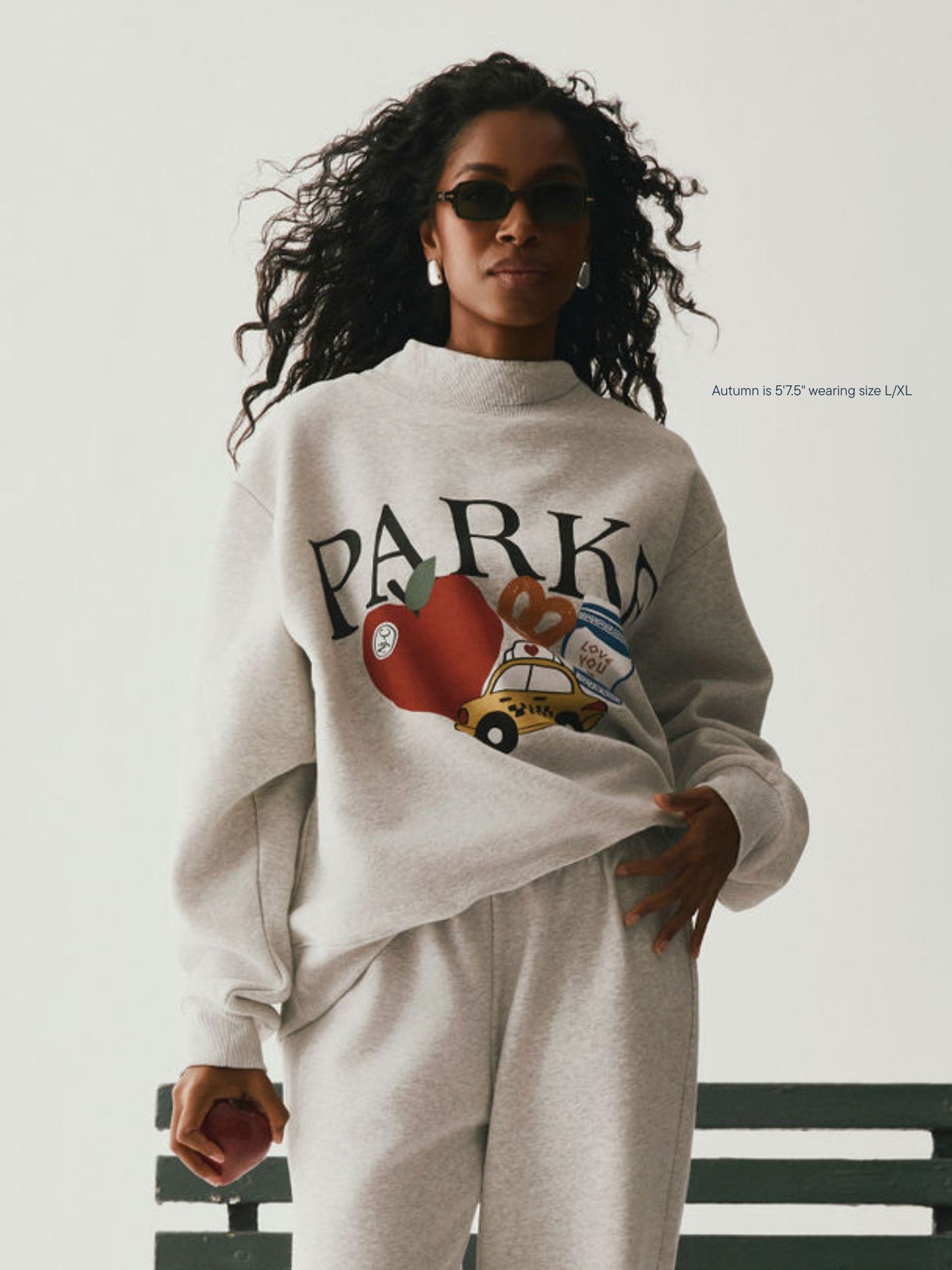 girl wearing Cities Graphic Mockneck -new york