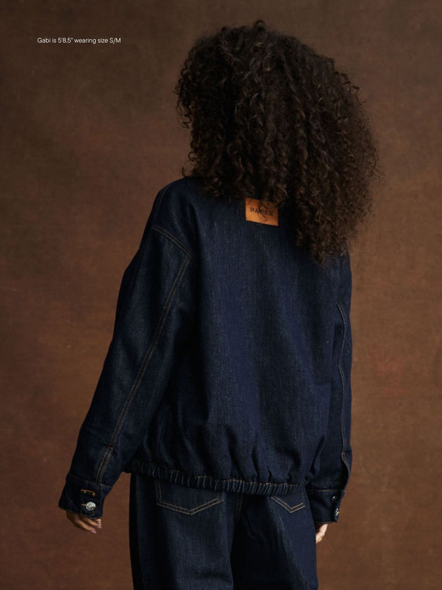 girl wearing Lined Denim Bomber Jacket -dark wash