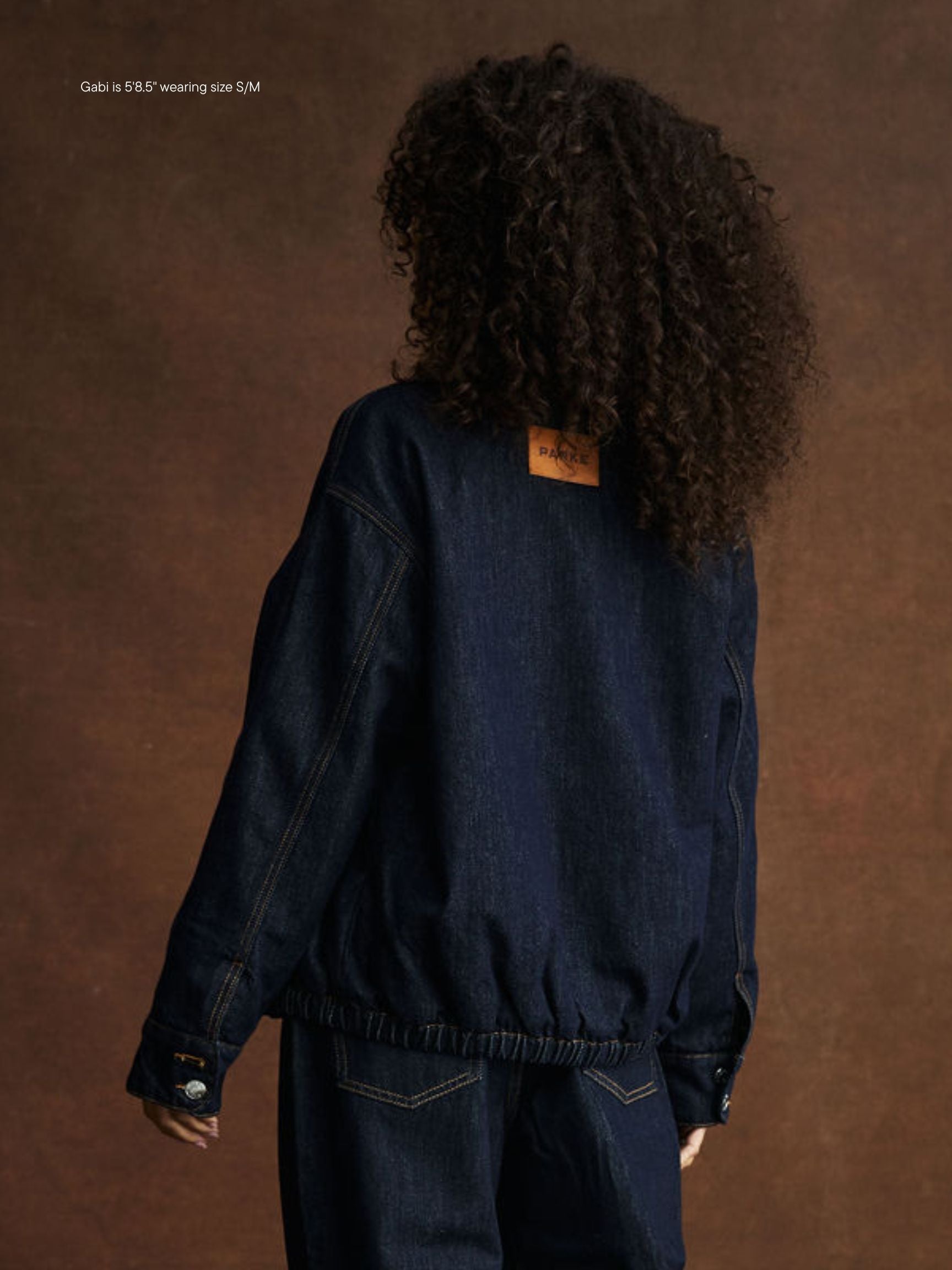 girl wearing Lined Denim Bomber Jacket -dark wash
