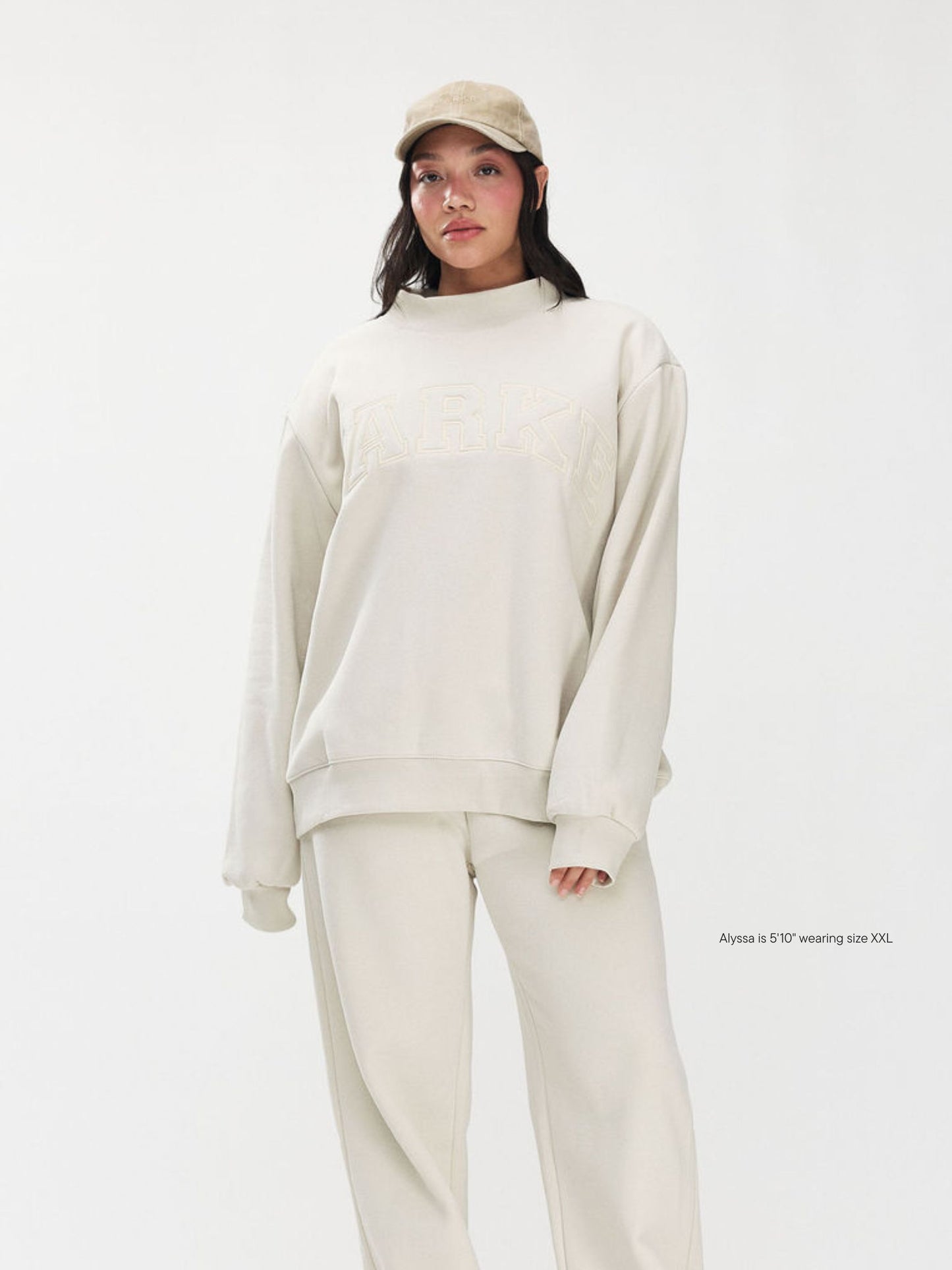 girl wearing Monochrome Varsity Mockneck -oat