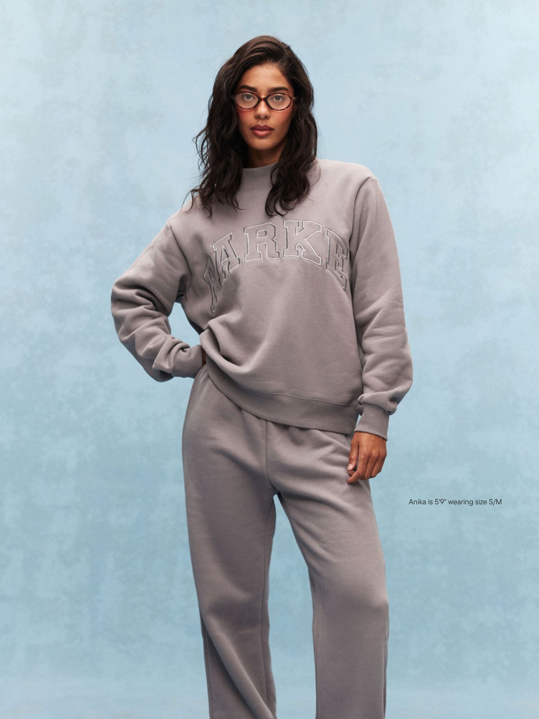 girl wearing Monochrome Varsity Mockneck -stone