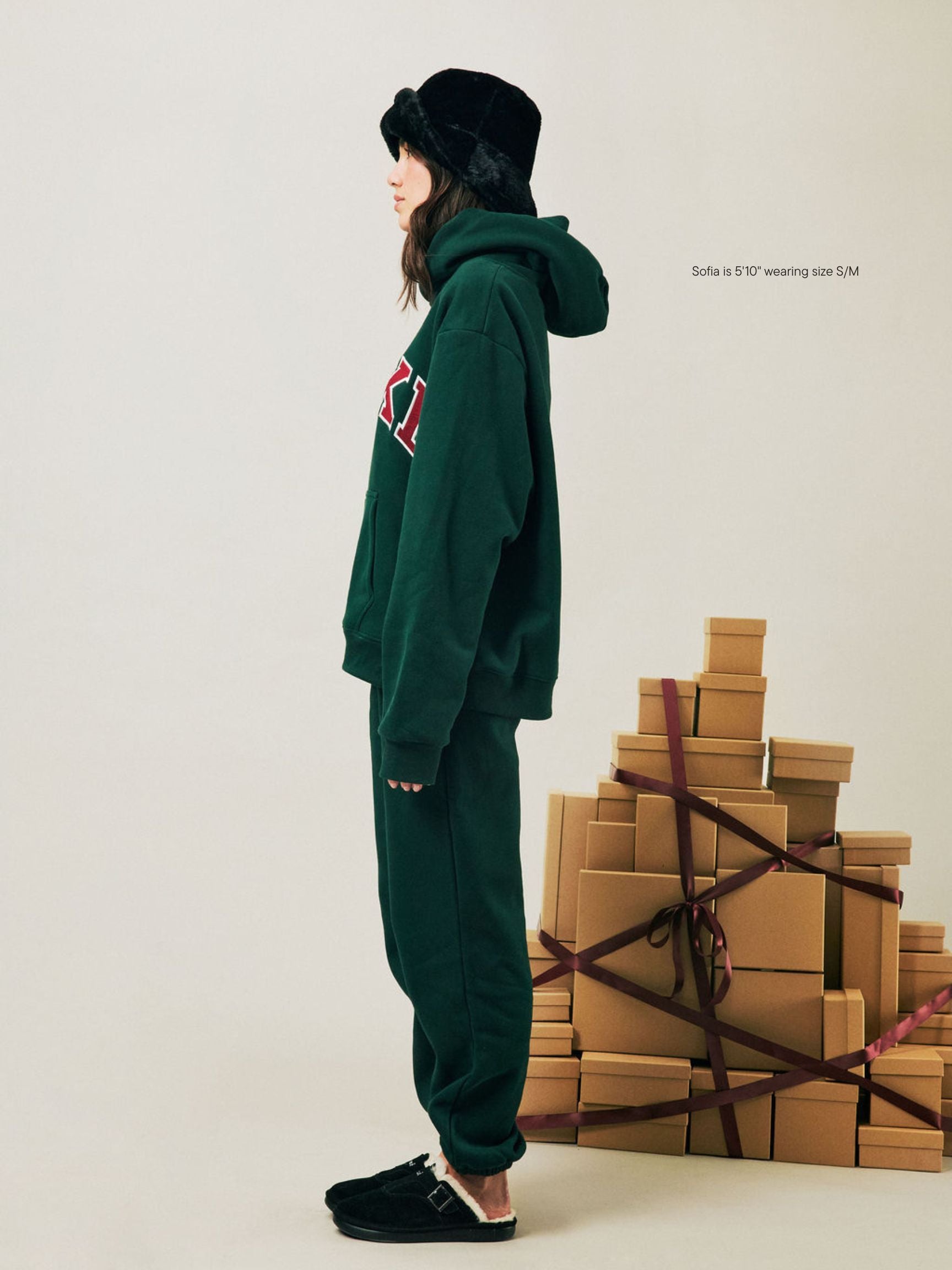 girl wearing Holiday Drawstring Unisex Sweatpants -forest